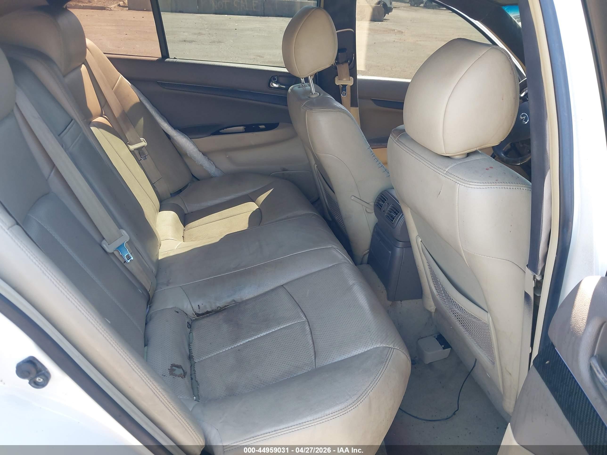 2009 Infiniti G37x   White vin: JNKCV61F49M050375