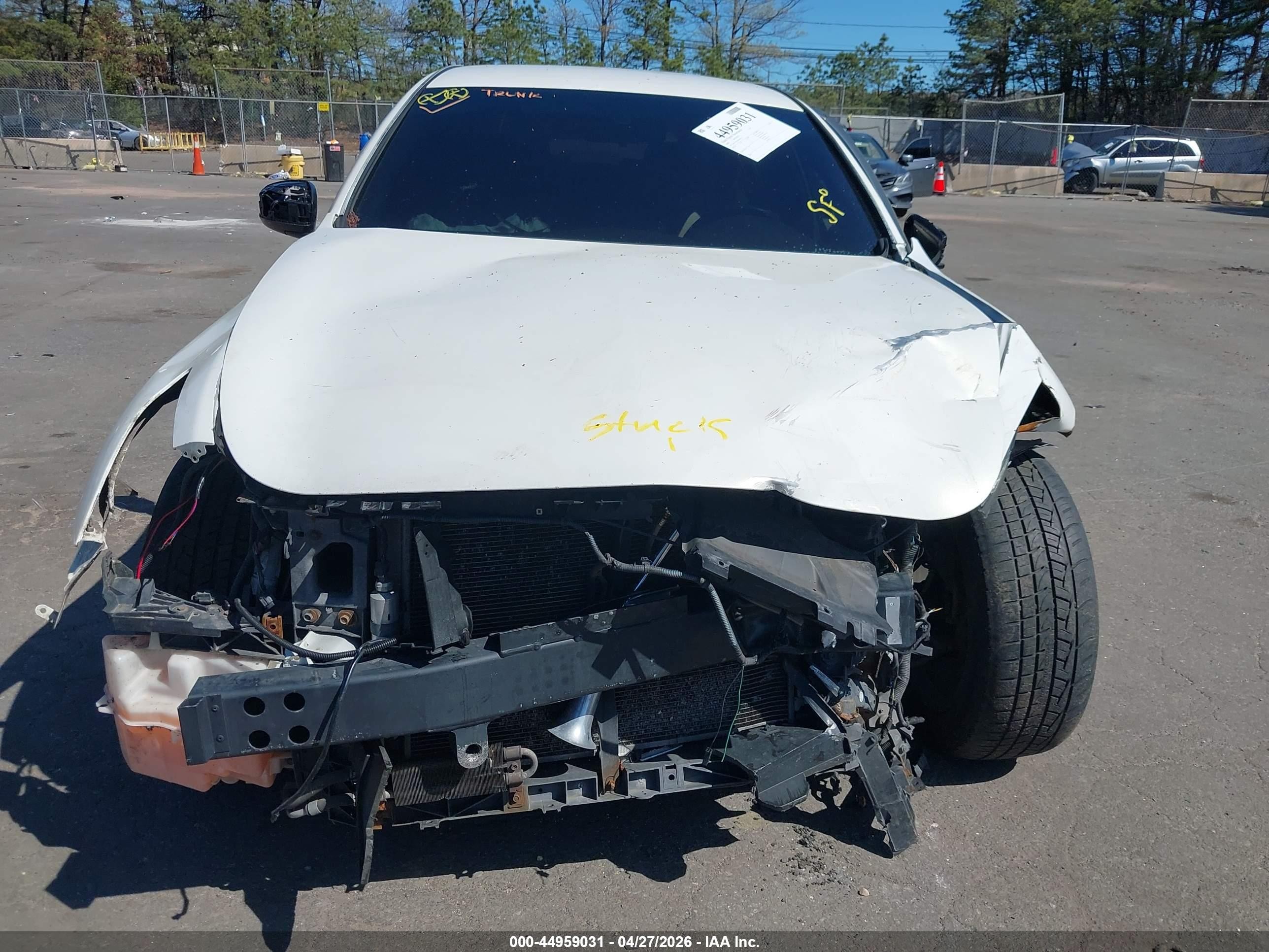 2009 Infiniti G37x   White vin: JNKCV61F49M050375