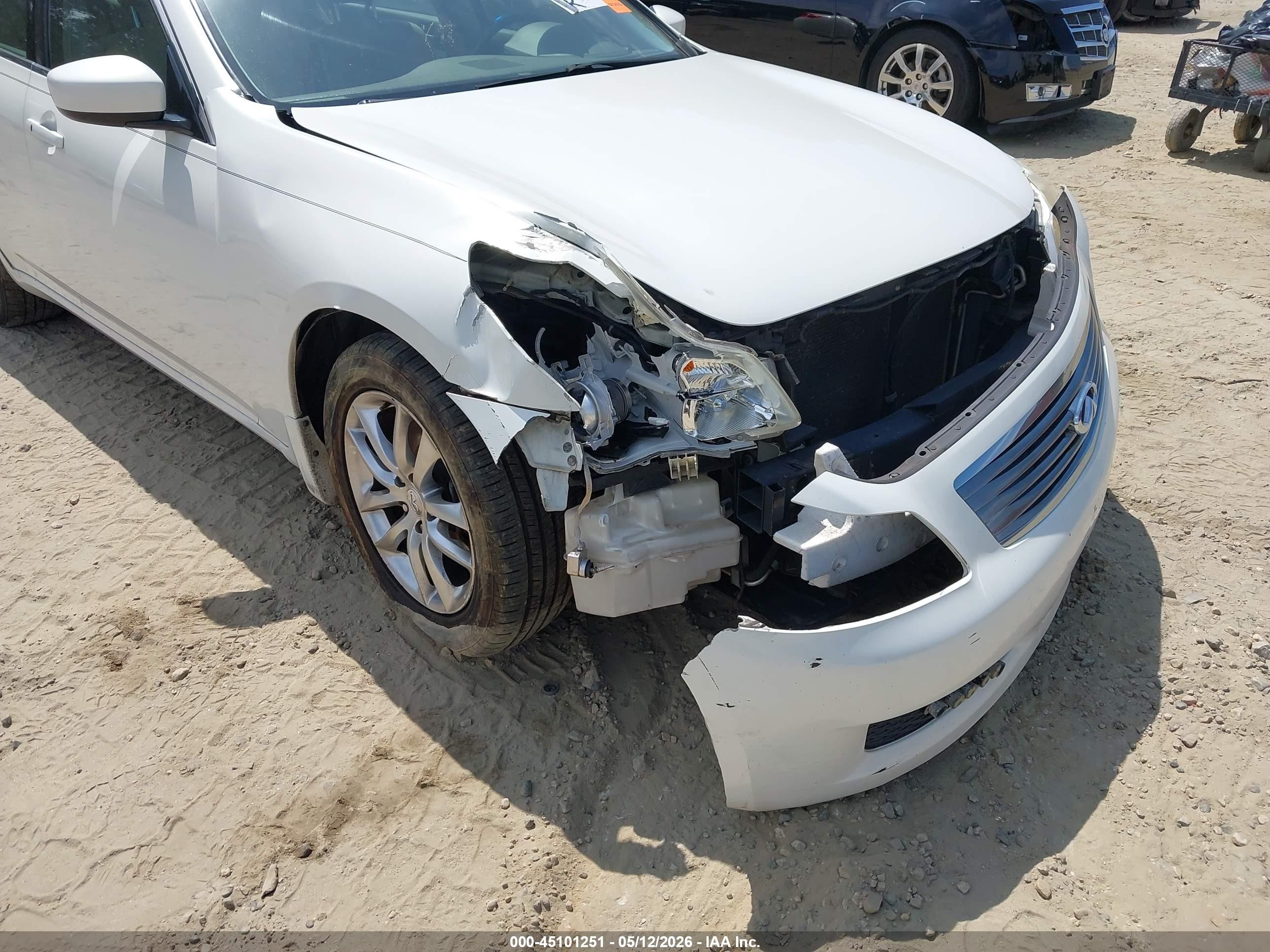 2009 Infiniti G37x   White vin: JNKCV61F79M053870