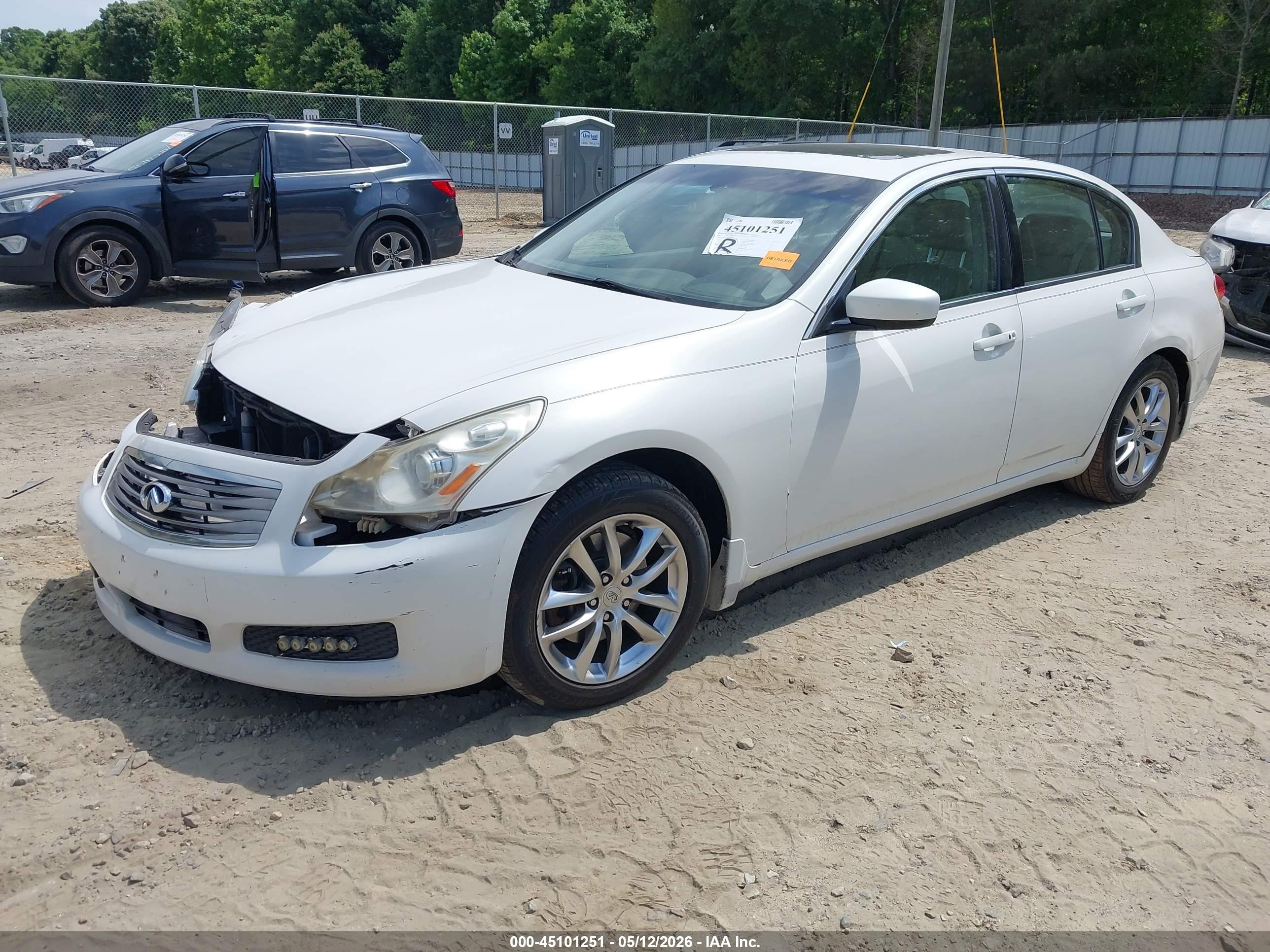 2009 Infiniti G37x   White vin: JNKCV61F79M053870