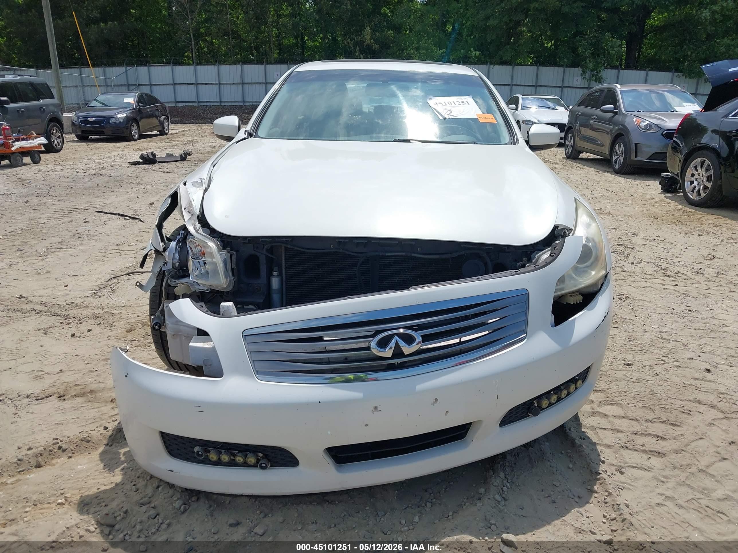 2009 Infiniti G37x   White vin: JNKCV61F79M053870
