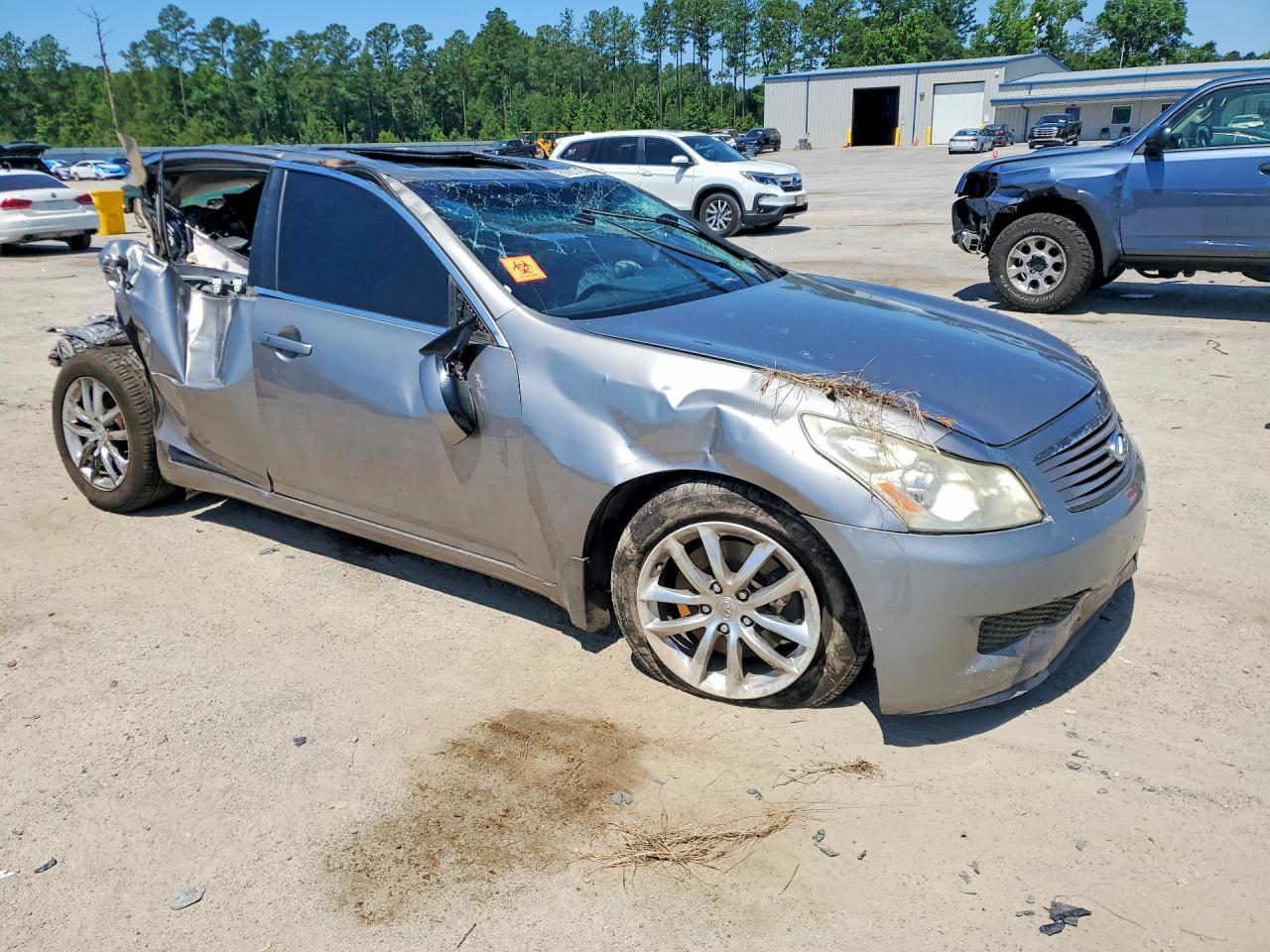 2009 Infiniti G37 Sedan X Tan vin: JNKCV61F79M352369