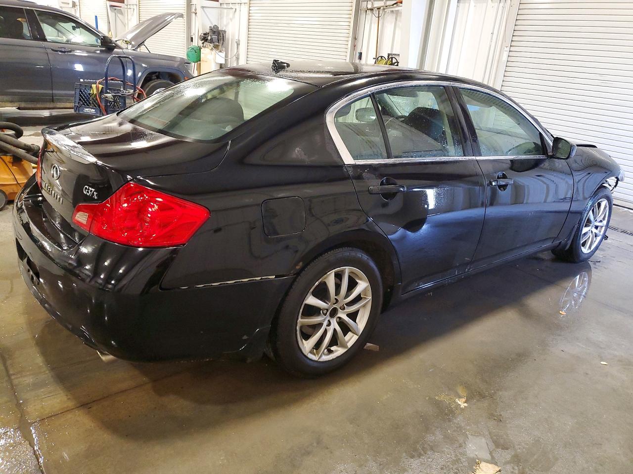 2009 Infiniti G37 Sedan X Black vin: JNKCV61F99M354639