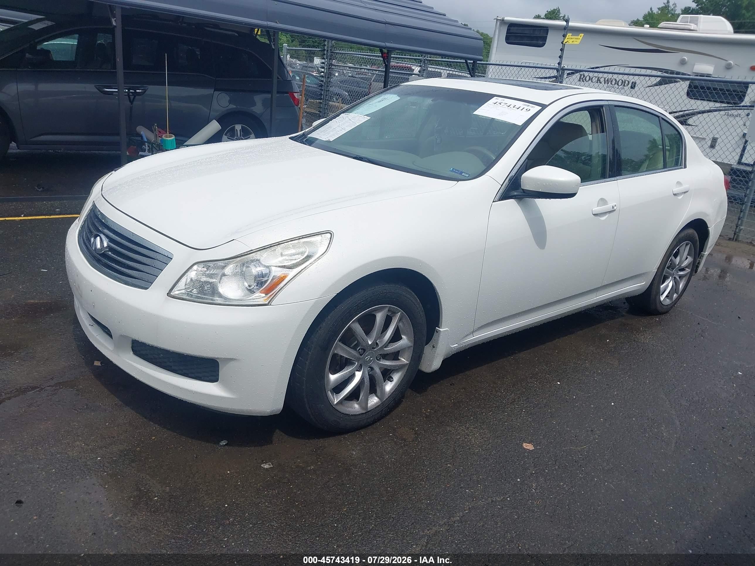 2009 Infiniti G37x   Белый vin: JNKCV61F99M355581