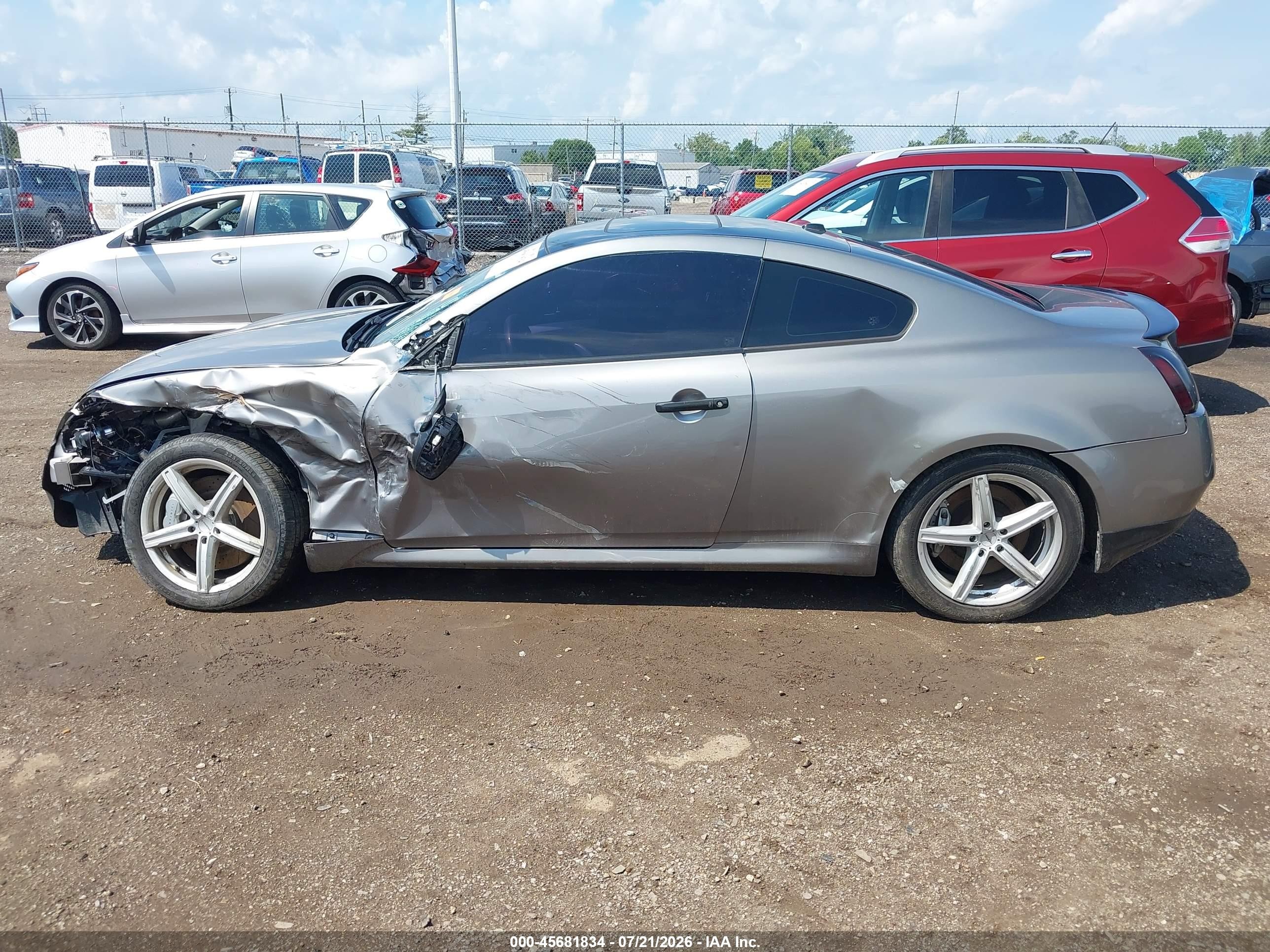 2009 Infiniti G37 Sport Champagne vin: JNKCV64E59M604025