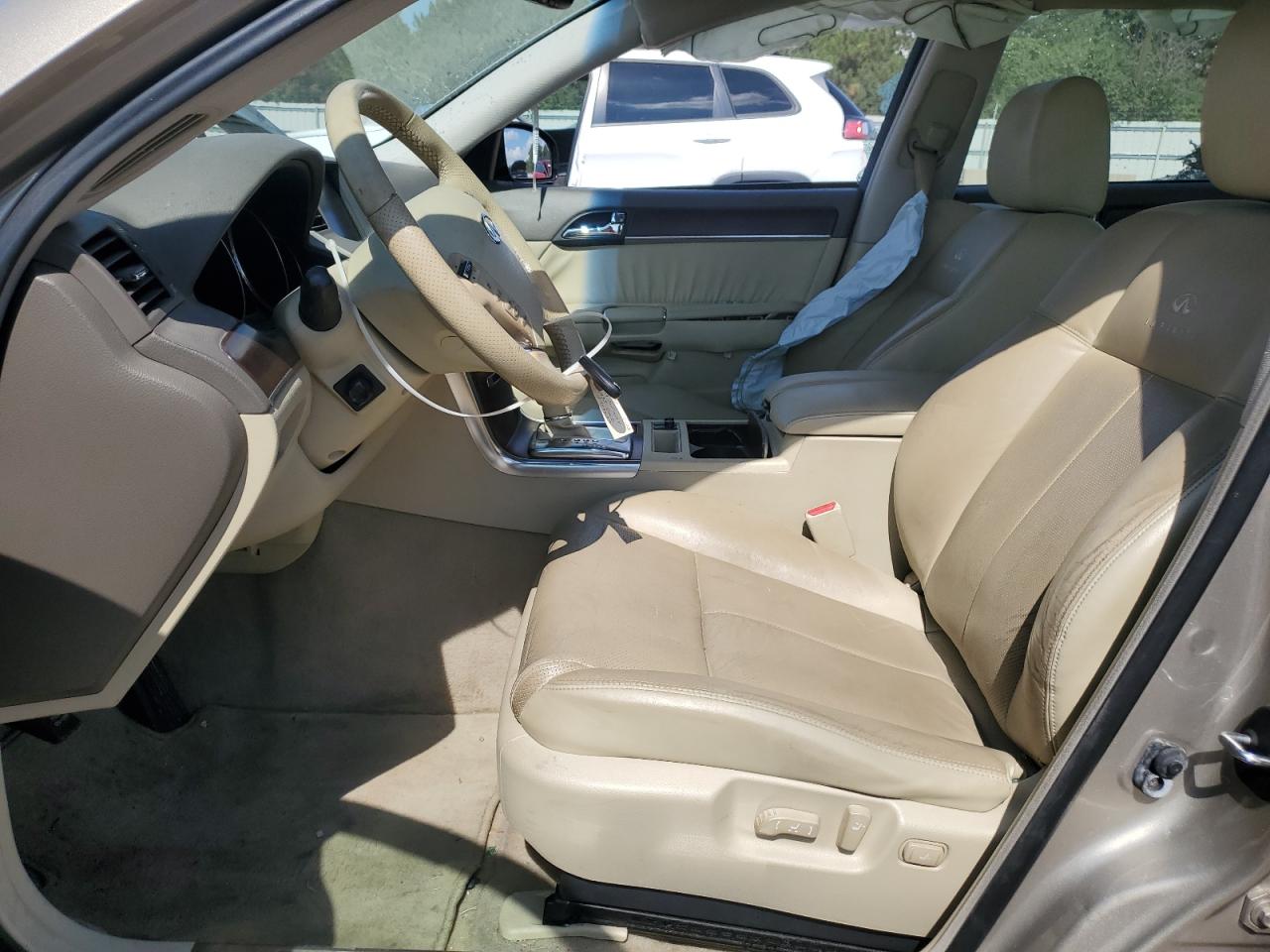2009 Infiniti M35 Base Tan vin: JNKCY01E29M802201