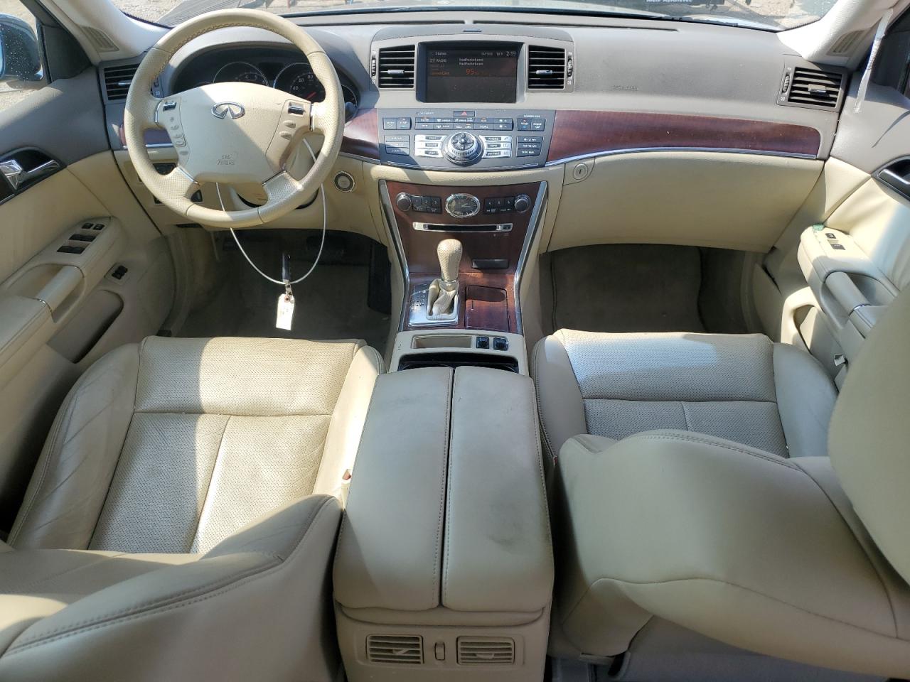 2009 Infiniti M35 Base Tan vin: JNKCY01E29M802201