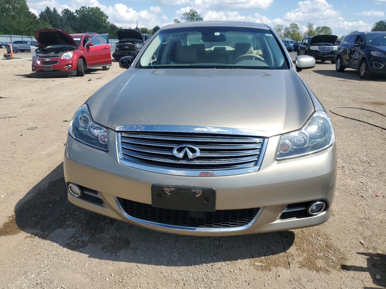 2009 Infiniti M35 Base Tan vin: JNKCY01E29M802201