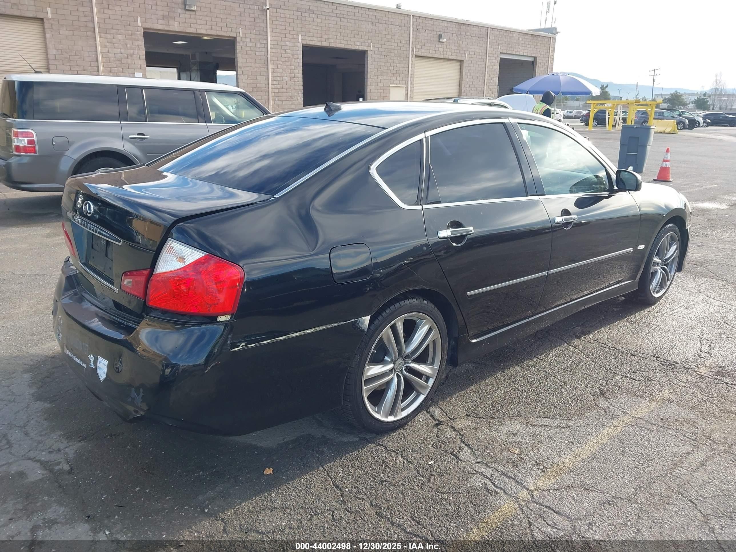 2009 Infiniti M35   Black vin: JNKCY01E29M802540