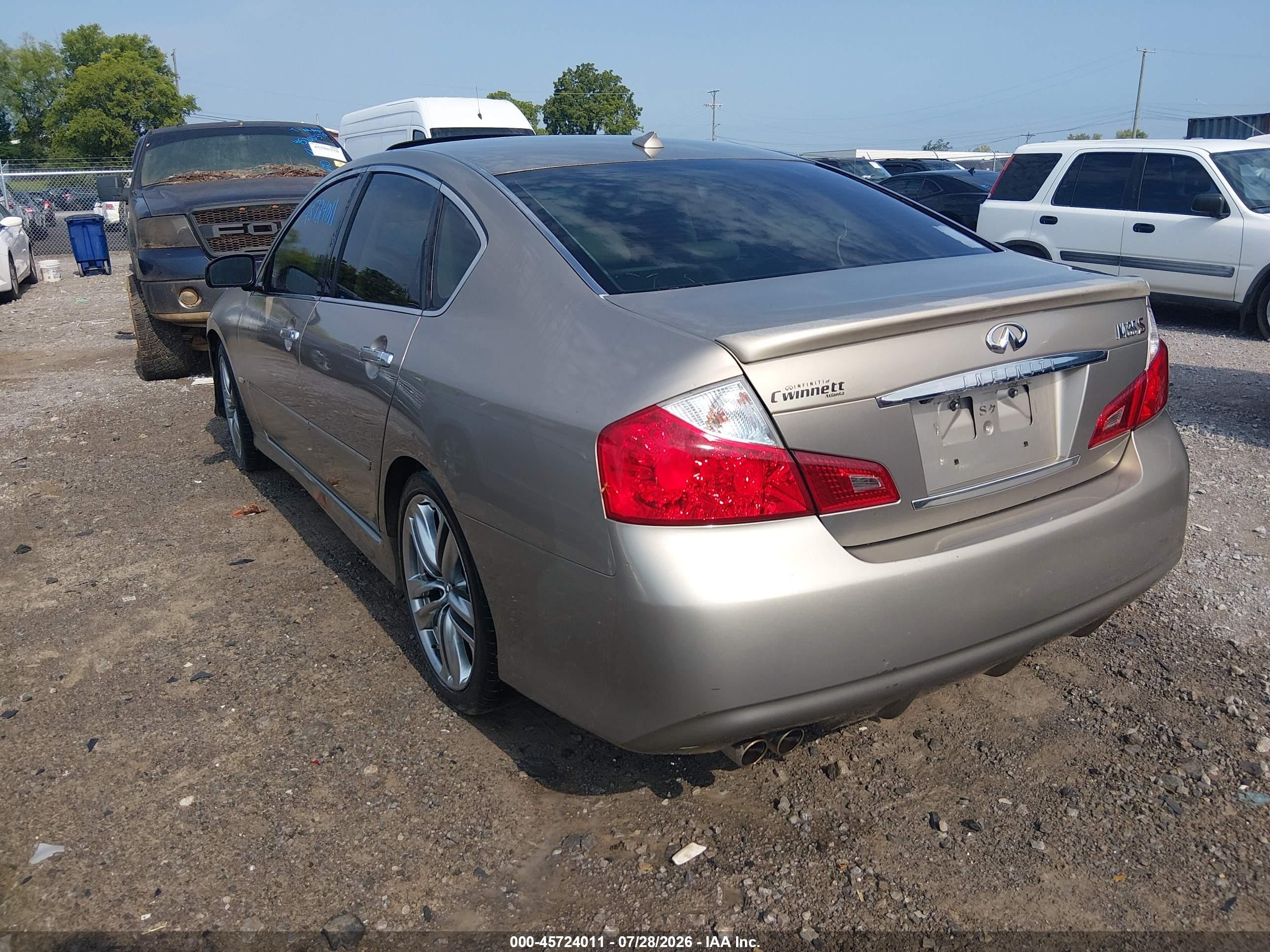 2009 Infiniti M35   Gold vin: JNKCY01E59M800765