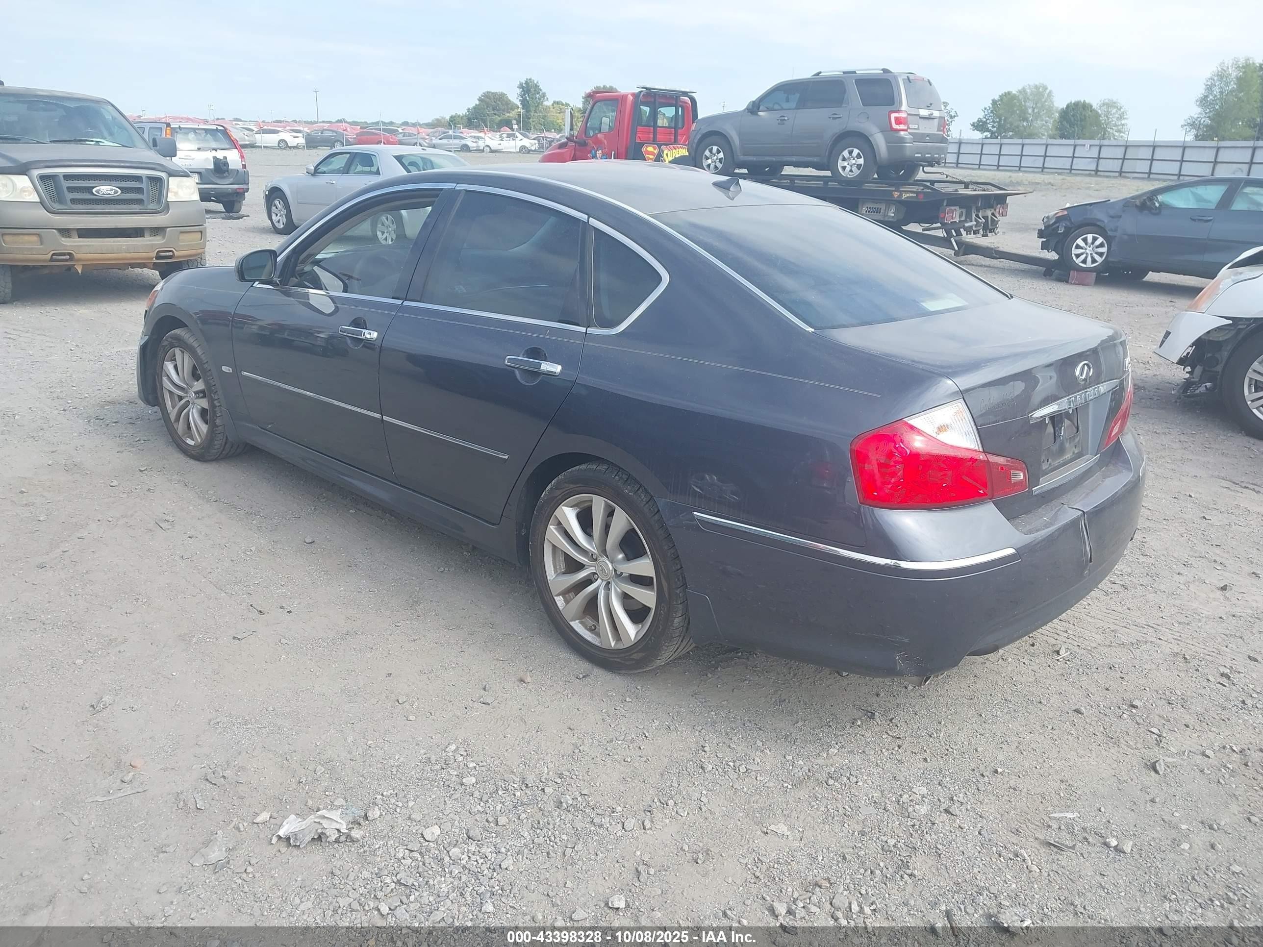 2009 Infiniti M35   Blue vin: JNKCY01E79M802324
