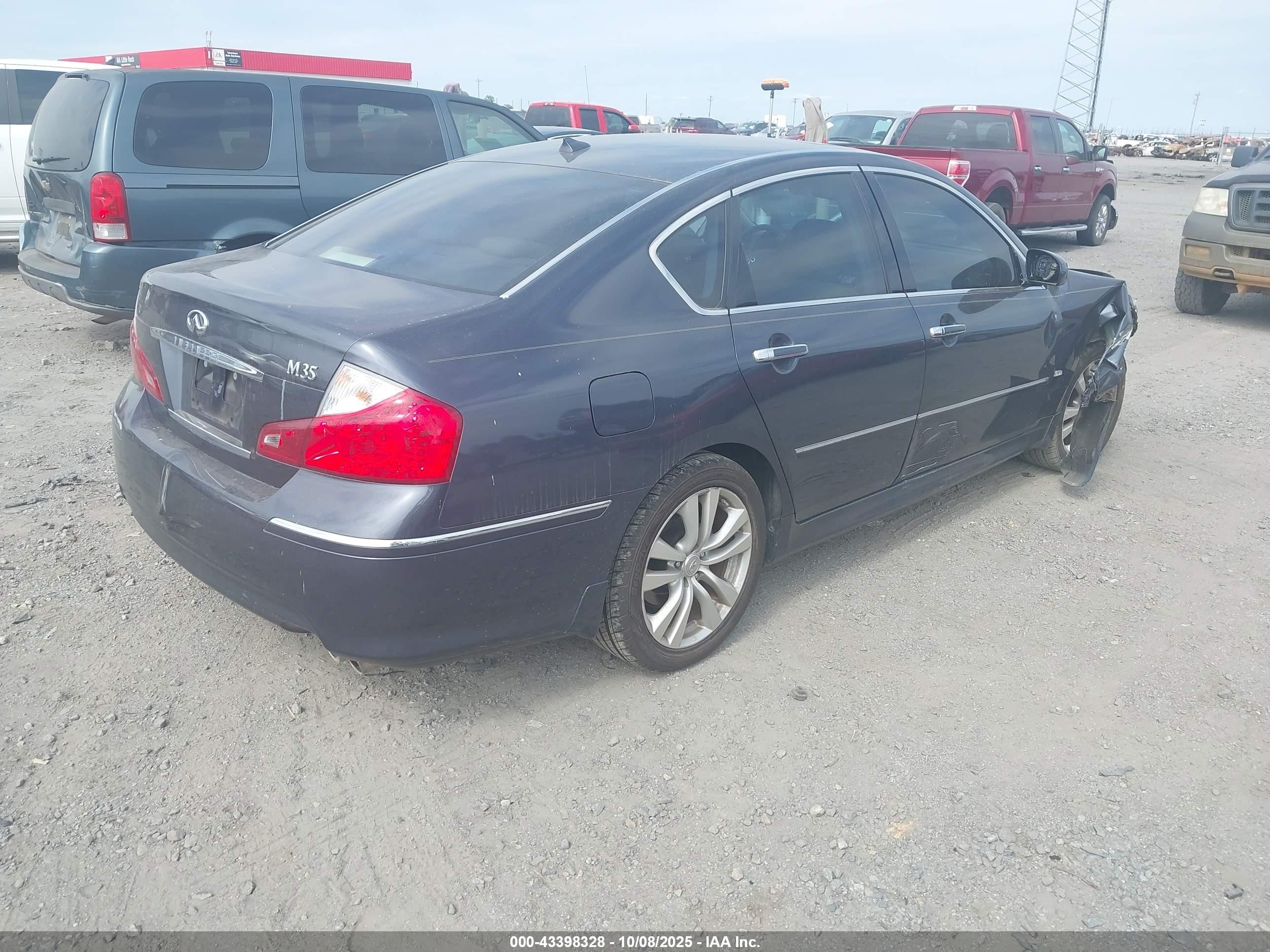 2009 Infiniti M35   Blue vin: JNKCY01E79M802324