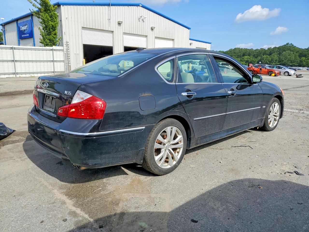2009 Infiniti M35 Base Black vin: JNKCY01E99M801238