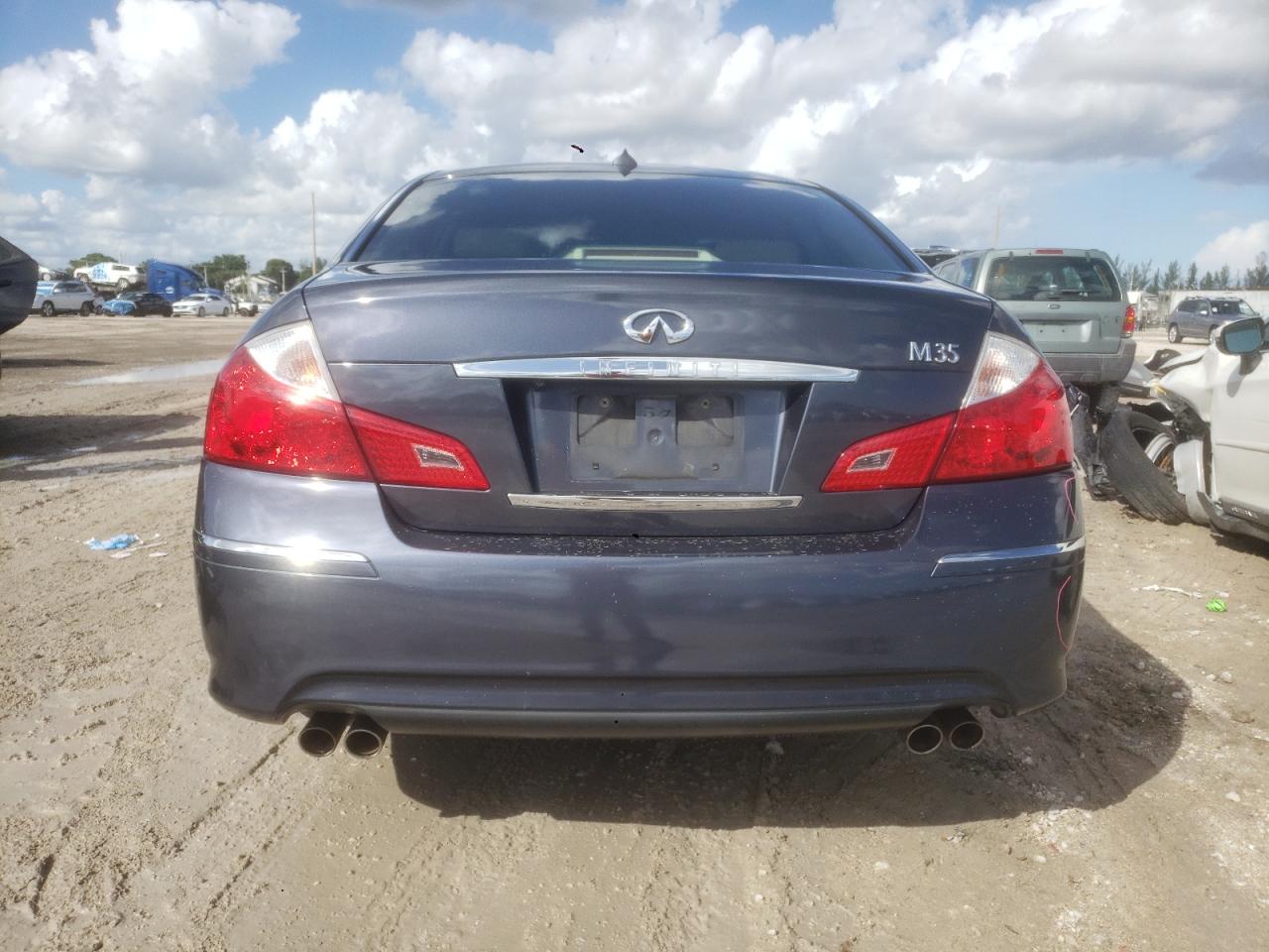 2009 Infiniti M35 Base Blue vin: JNKCY01EX9M800843