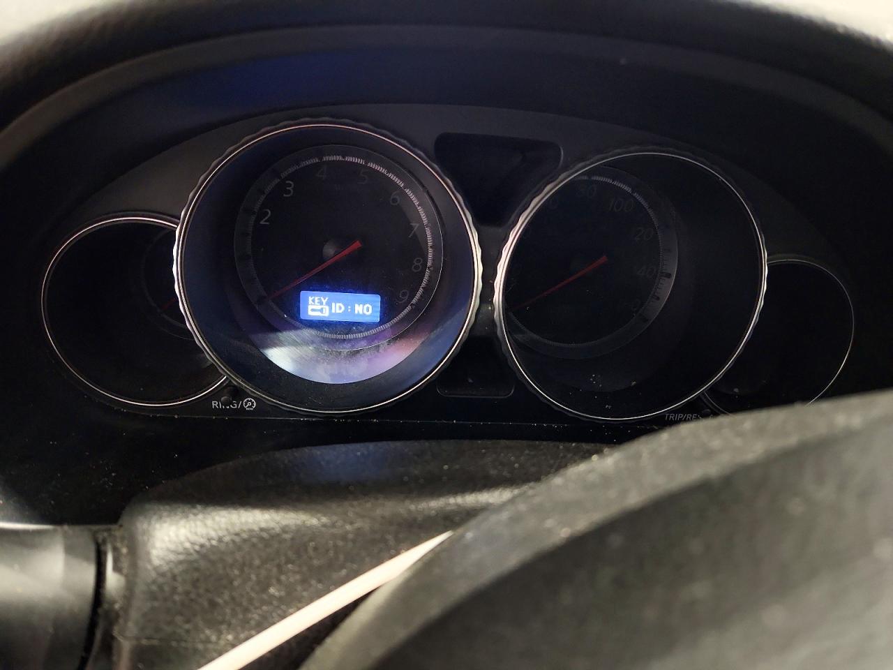 2009 Infiniti M35 X Tan vin: JNKCY01F09M851437