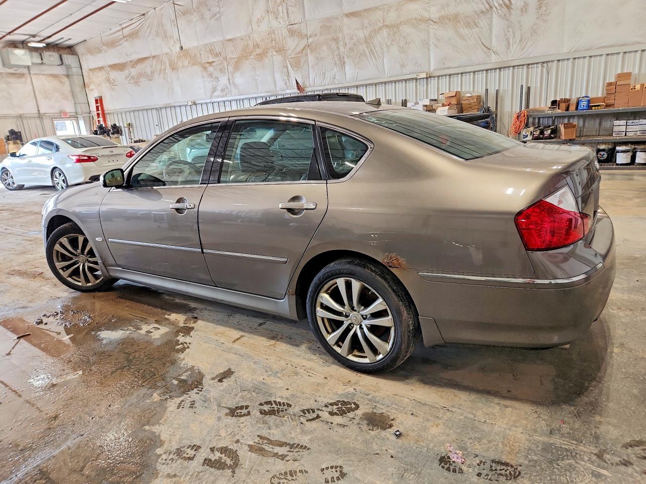 2009 Infiniti M35 X Tan vin: JNKCY01F09M851437