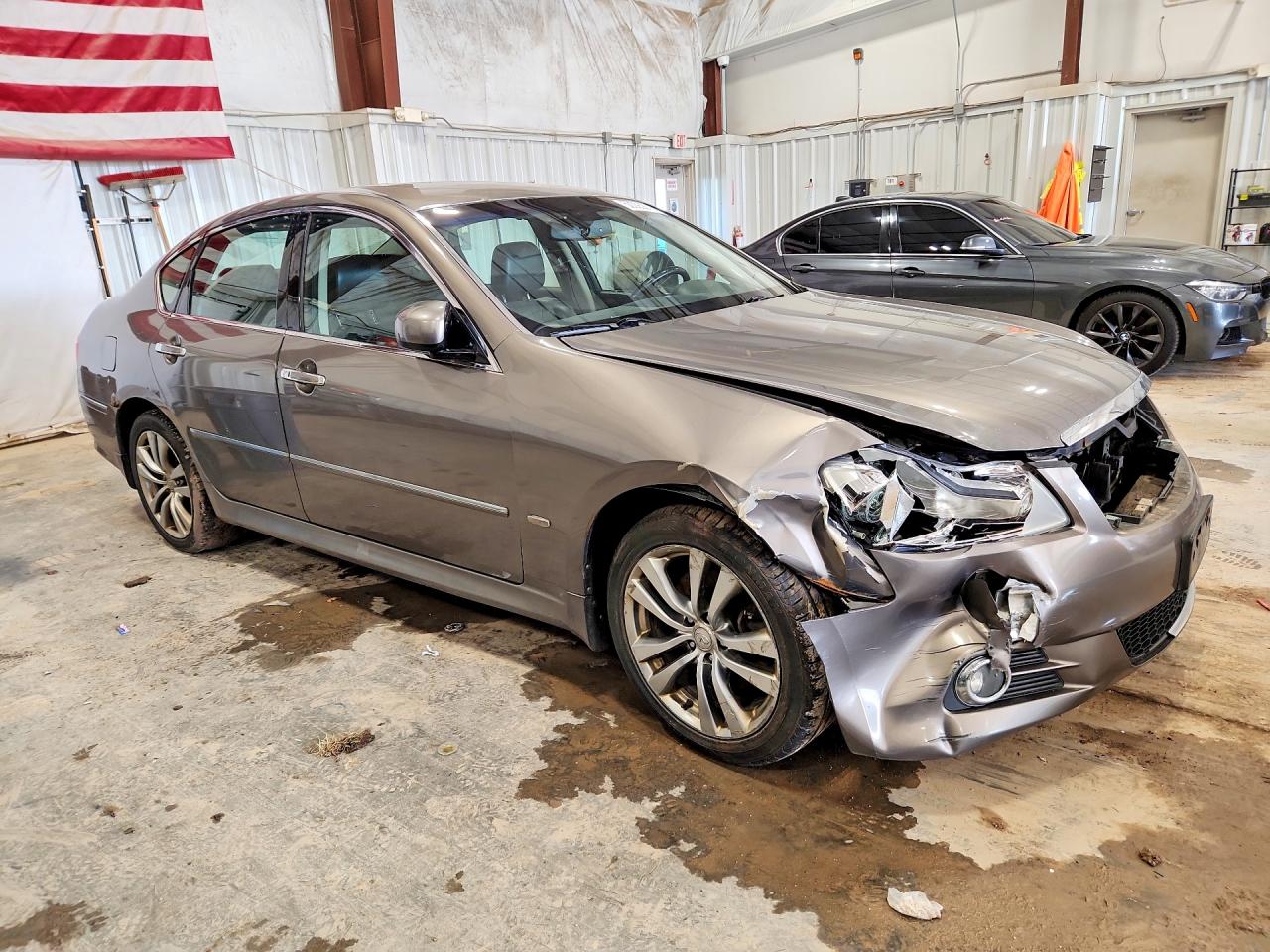 2009 Infiniti M35 X Tan vin: JNKCY01F09M851437