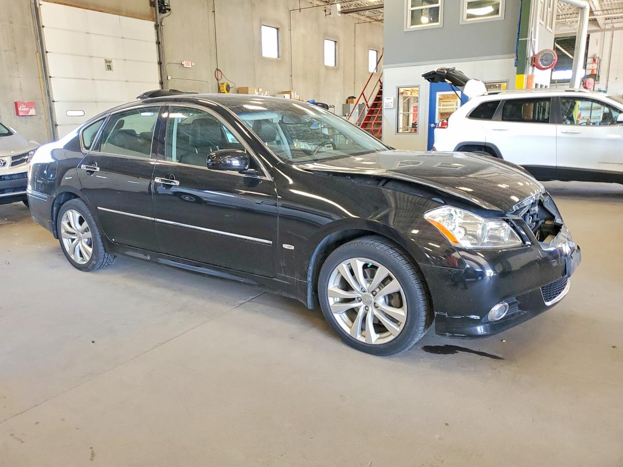 2009 Infiniti M35 X Black vin: JNKCY01F29M852217