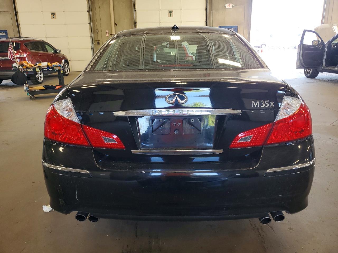 2009 Infiniti M35 X Black vin: JNKCY01F29M852217