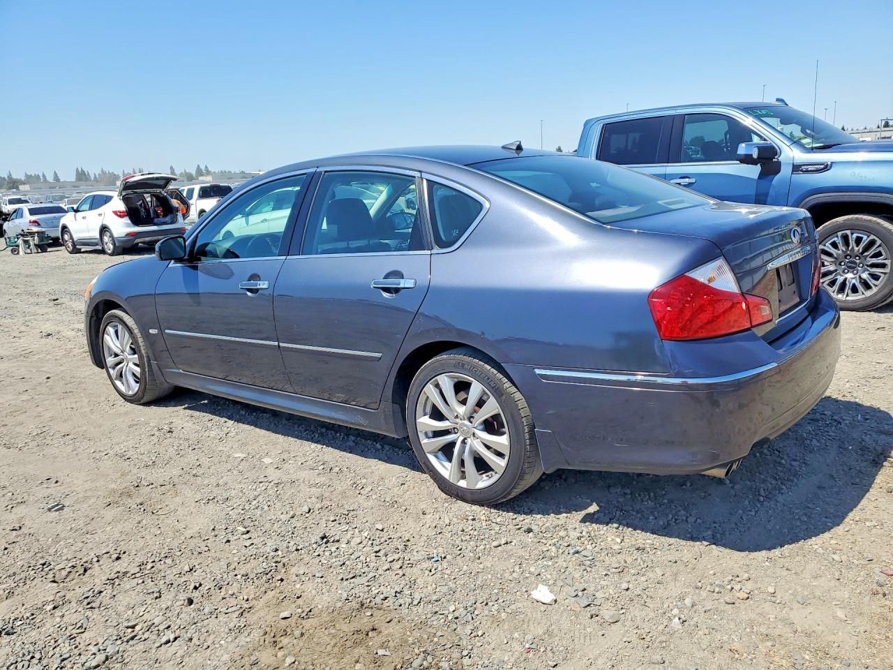 2009 Infiniti M35 X Blue vin: JNKCY01F89M851783