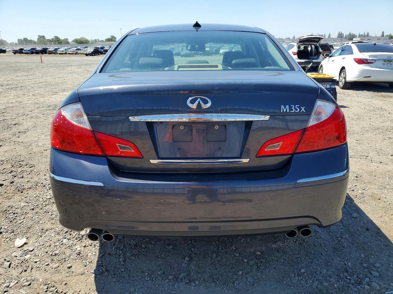2009 Infiniti M35 X Blue vin: JNKCY01F89M851783