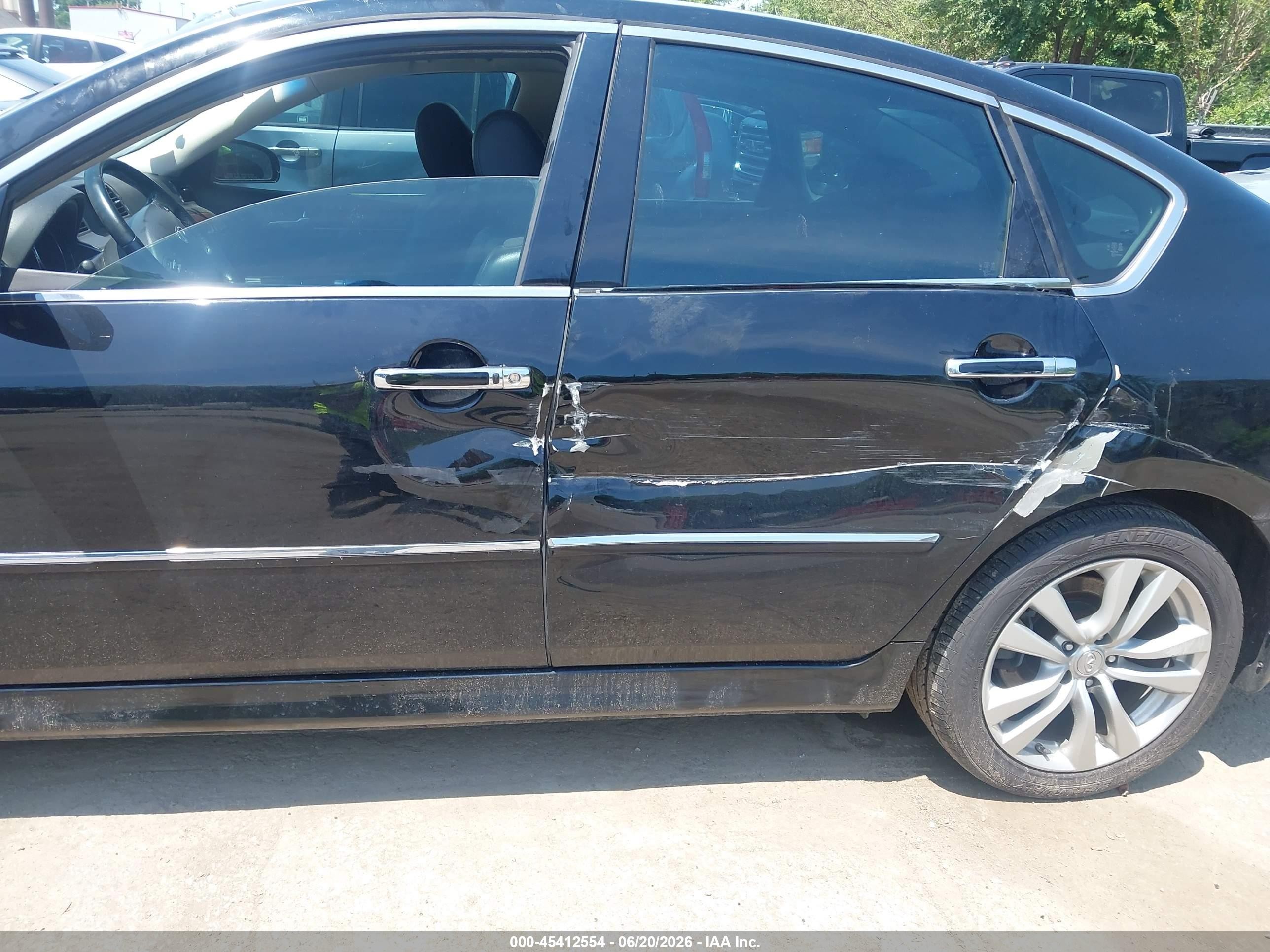 2009 Infiniti M35x   Black vin: JNKCY01F99M850092