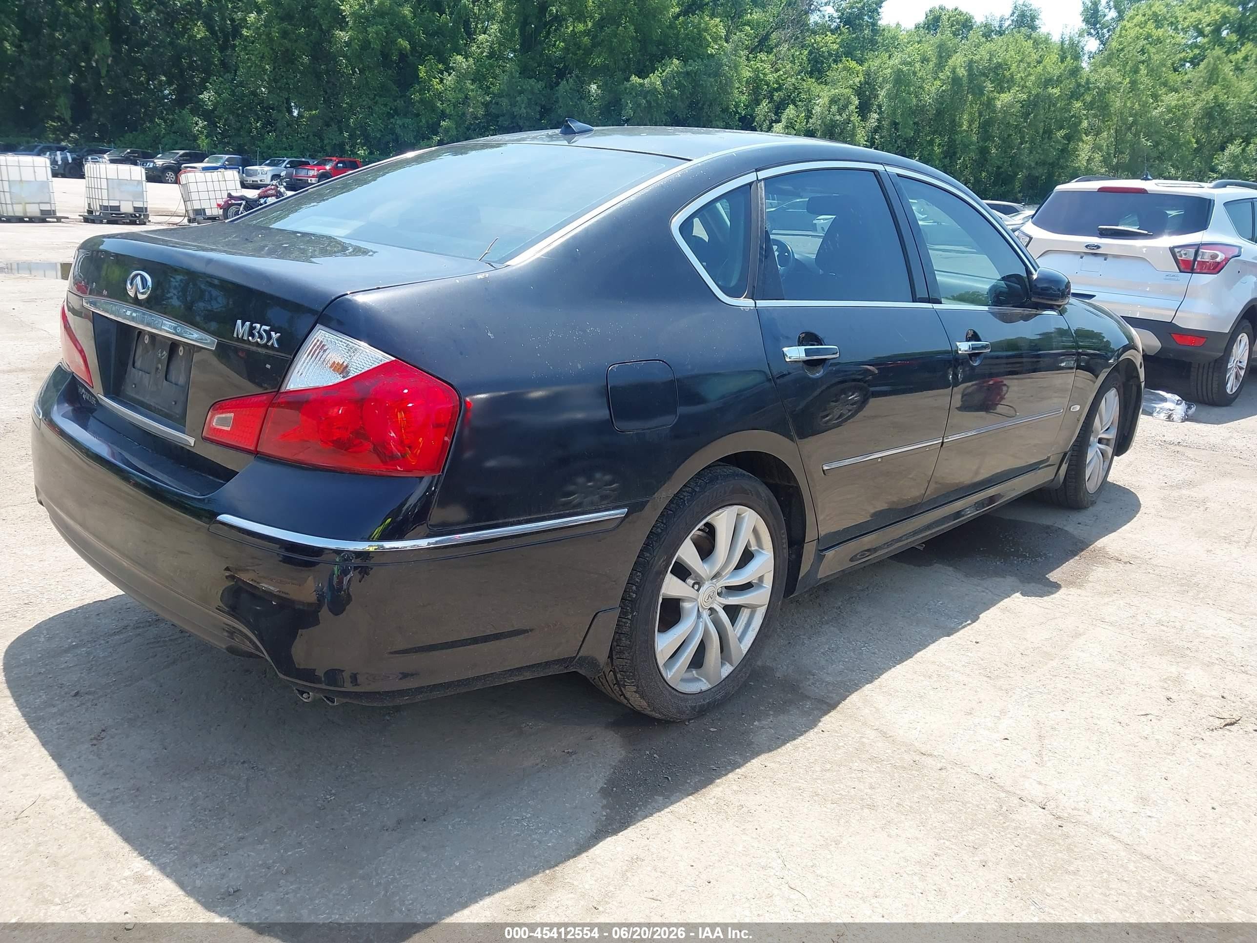 2009 Infiniti M35x   Black vin: JNKCY01F99M850092
