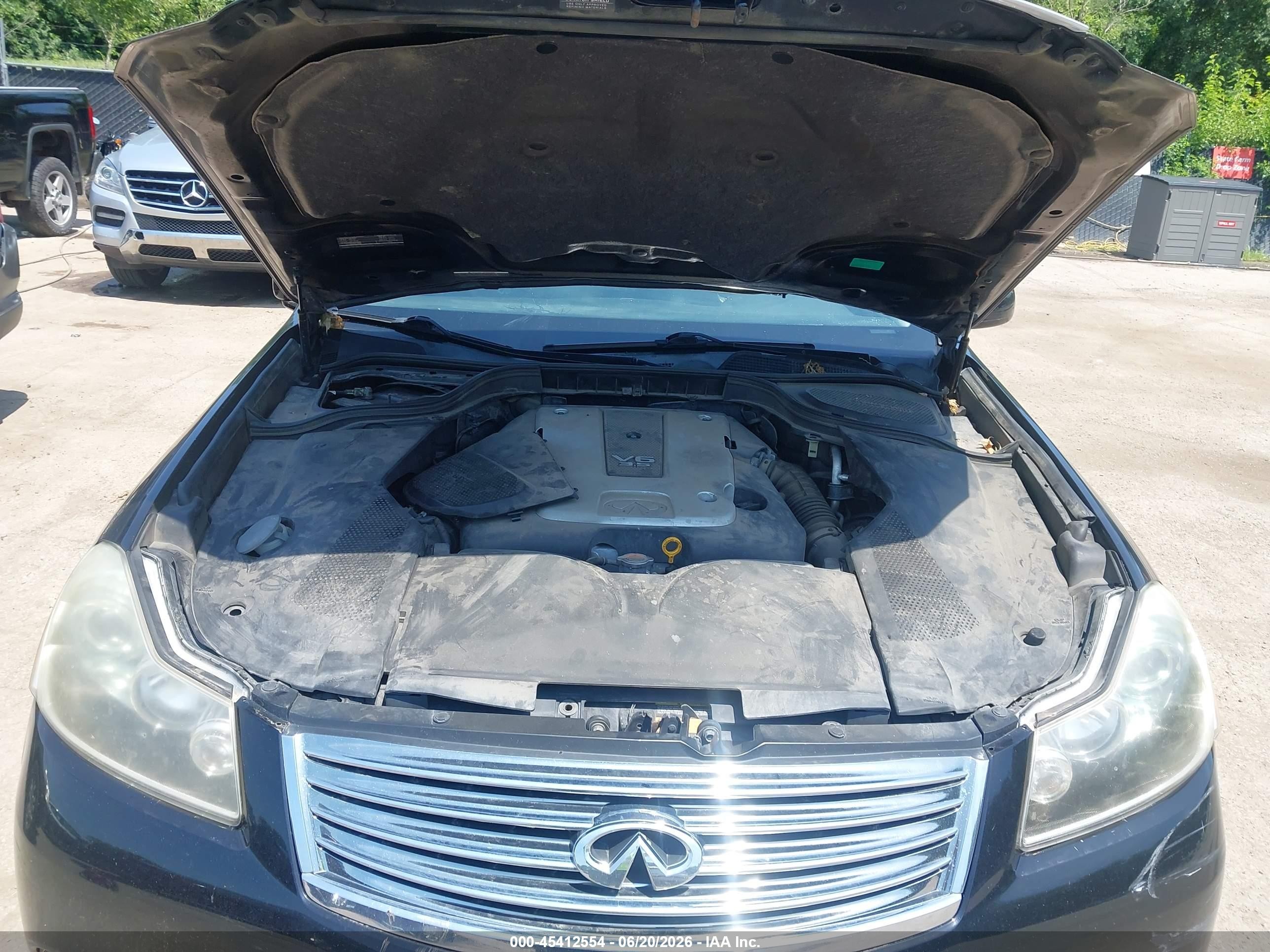 2009 Infiniti M35x   Black vin: JNKCY01F99M850092