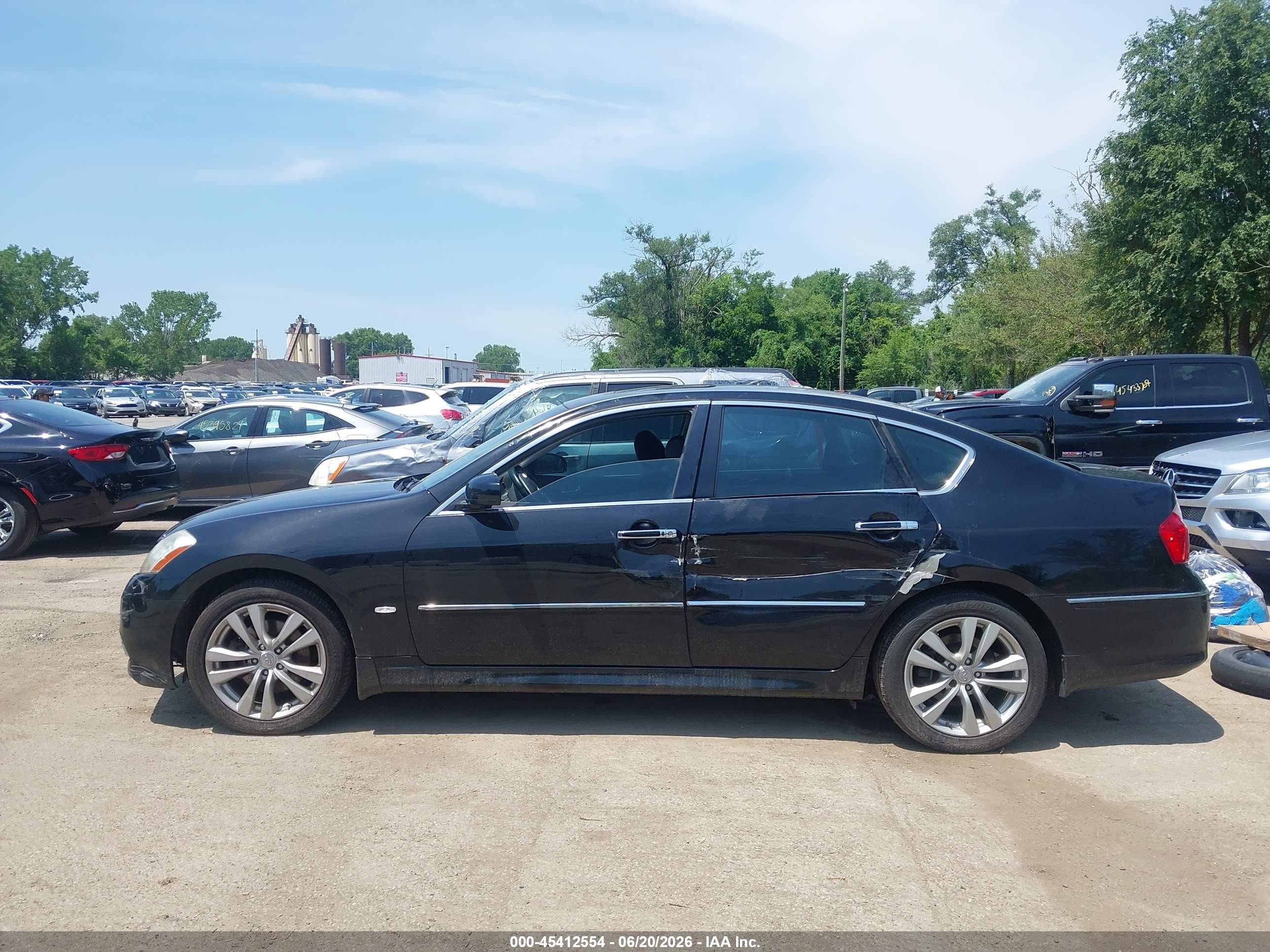 2009 Infiniti M35x   Black vin: JNKCY01F99M850092