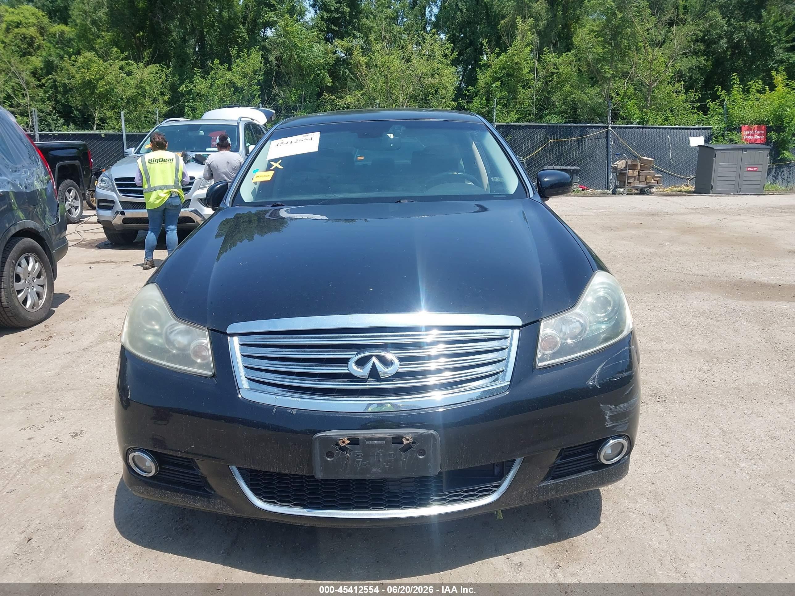 2009 Infiniti M35x   Black vin: JNKCY01F99M850092