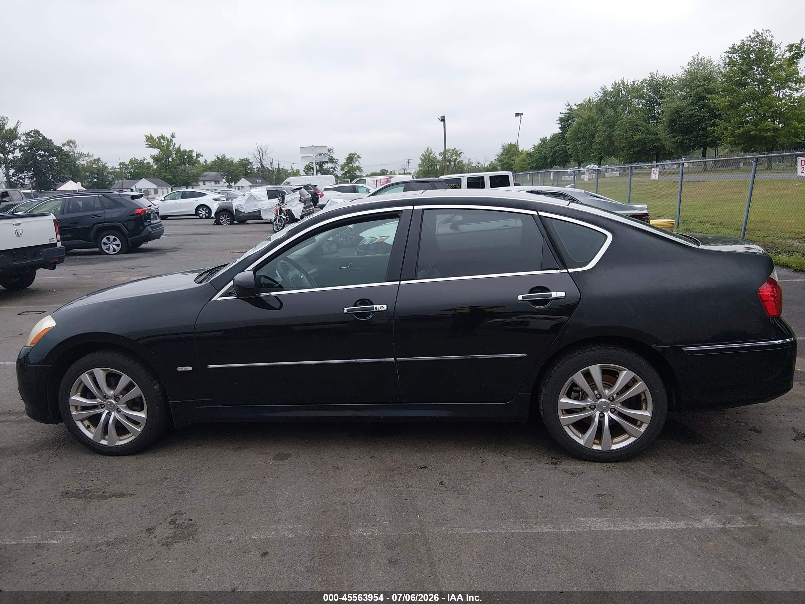 2009 Infiniti M35x   Black vin: JNKCY01F99M850612