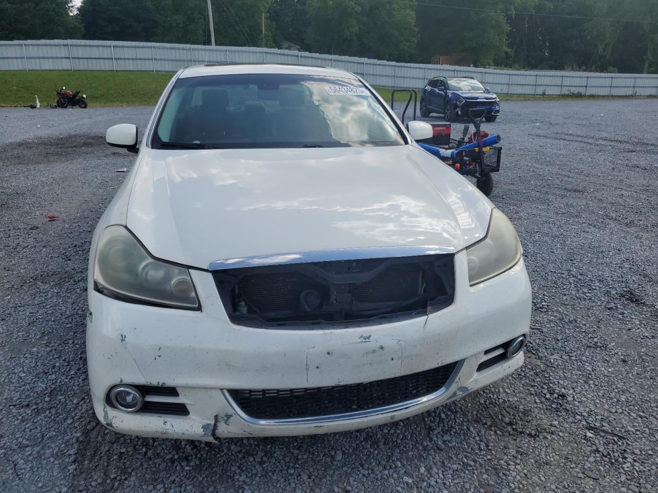 2009 Infiniti M35 Base White vin: JNKCY01FX9M850778