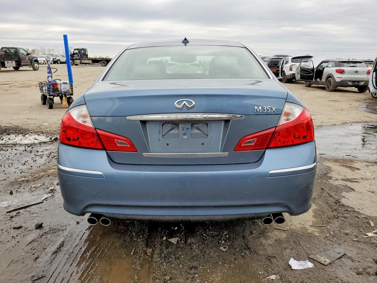 2009 Infiniti M35 Base Blue vin: JNKCY01FX9M851574