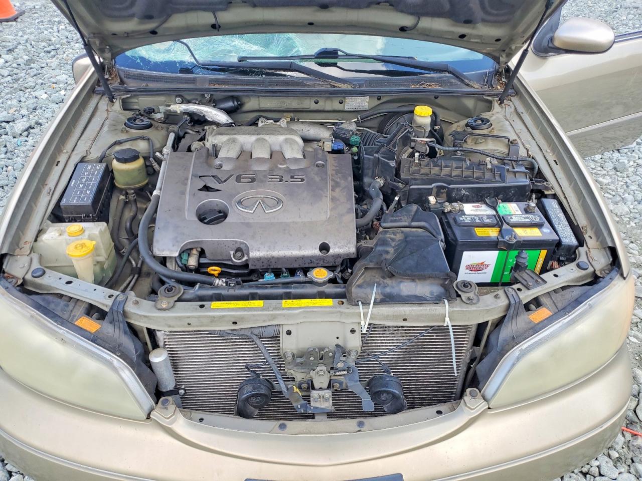 2002 Infiniti I35 Base Gold vin: JNKDA31A02T005139