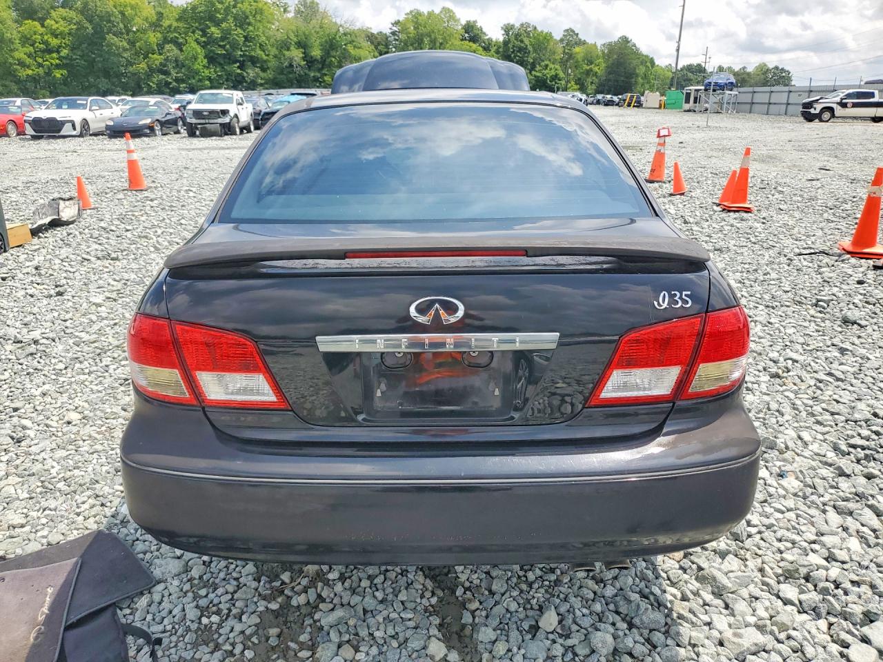 2002 Infiniti I35 Base Black vin: JNKDA31A02T007120