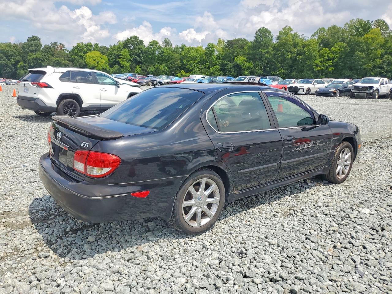 2002 Infiniti I35 Base Black vin: JNKDA31A02T007120
