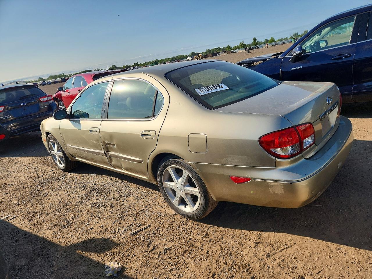 2002 Infiniti I35 Base Beige vin: JNKDA31A12T027361