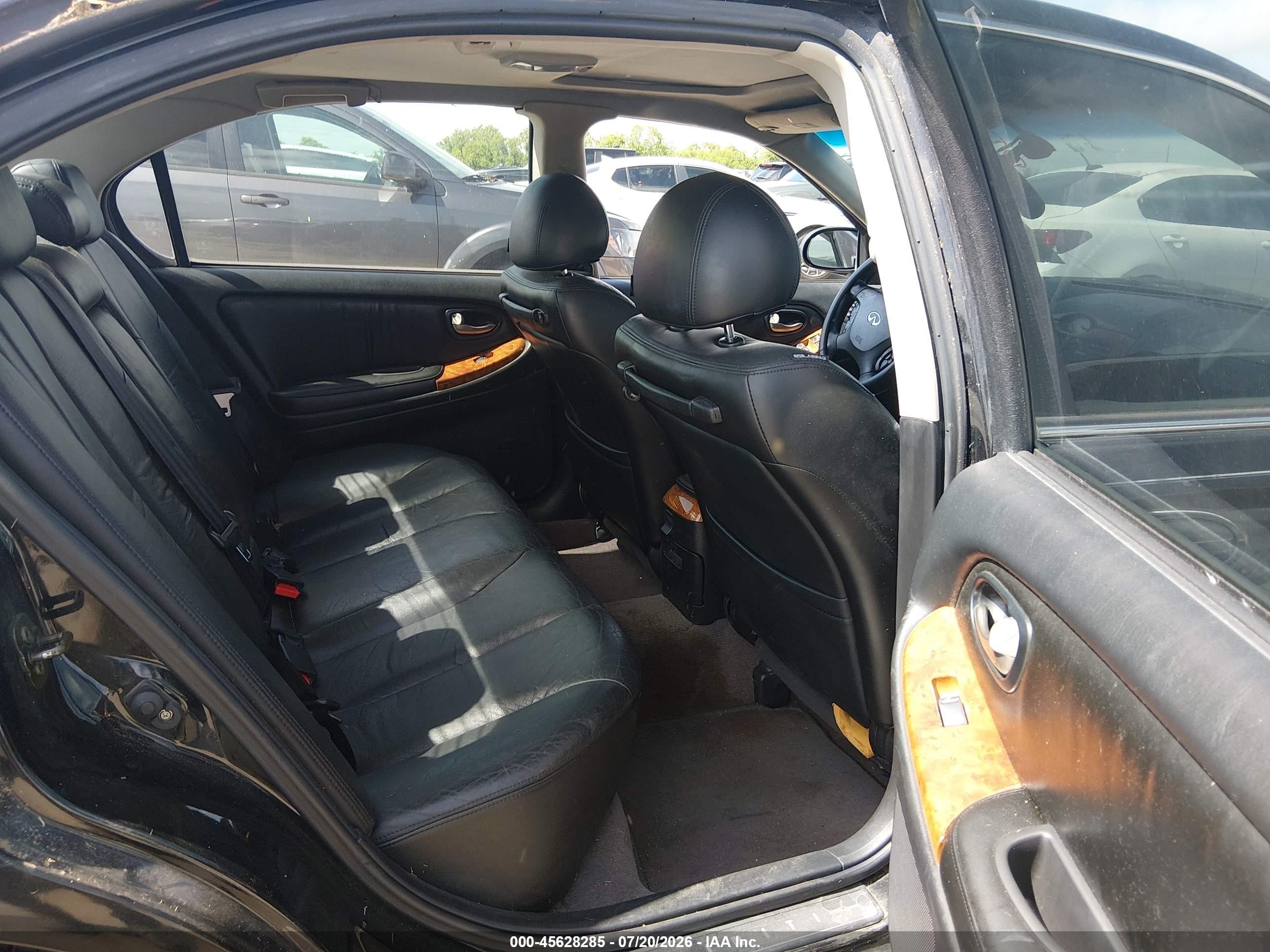 2002 Infiniti I35 Luxury Black vin: JNKDA31A42T027726
