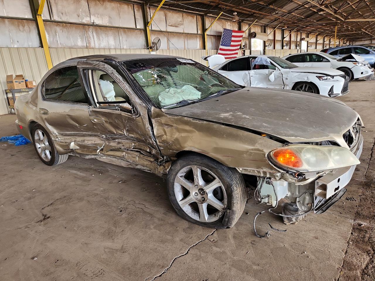 2002 Infiniti I35 Base Золотой vin: JNKDA31A52T009753