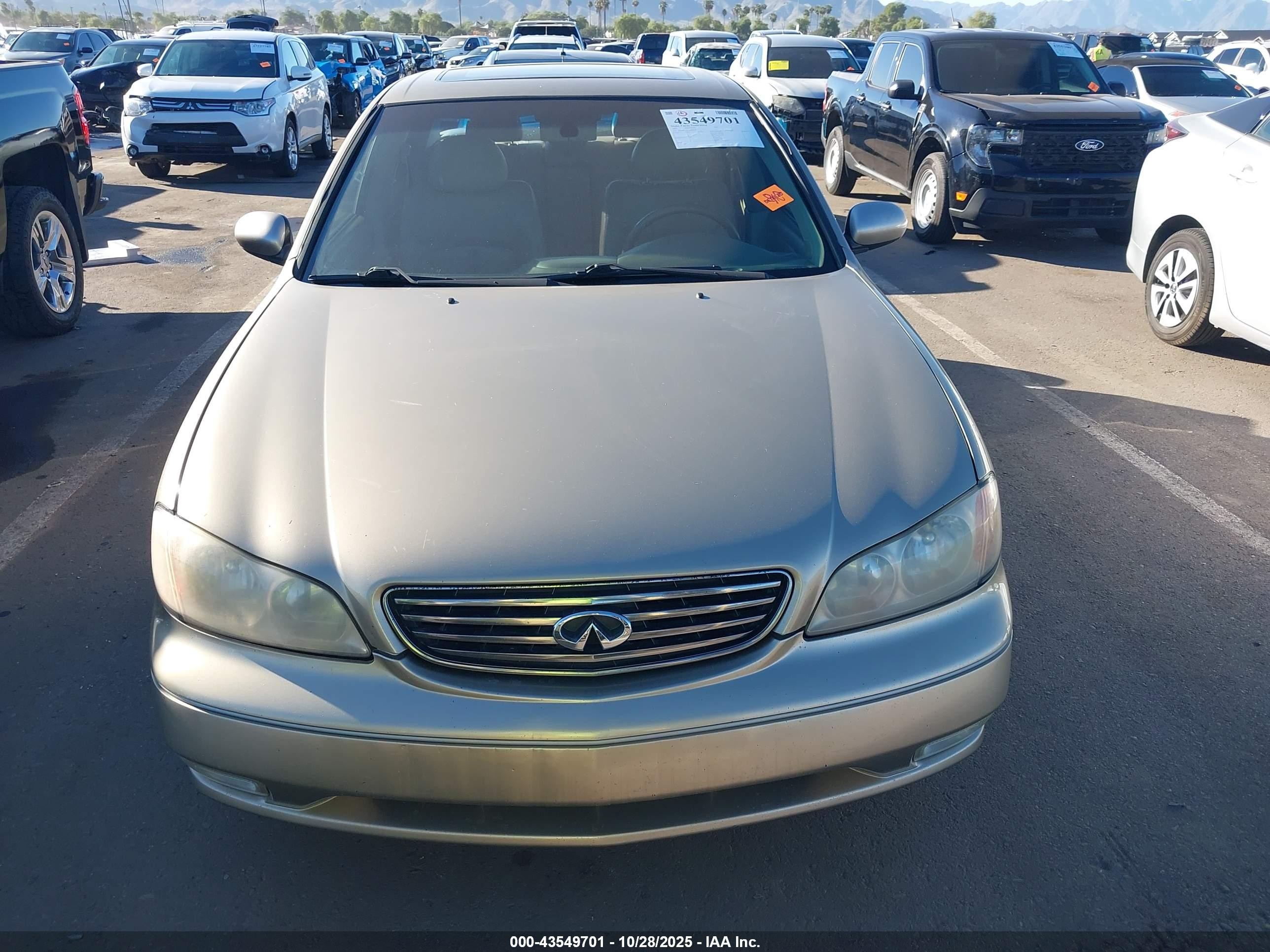 2002 Infiniti I35 Luxury Gold vin: JNKDA31A72T018342