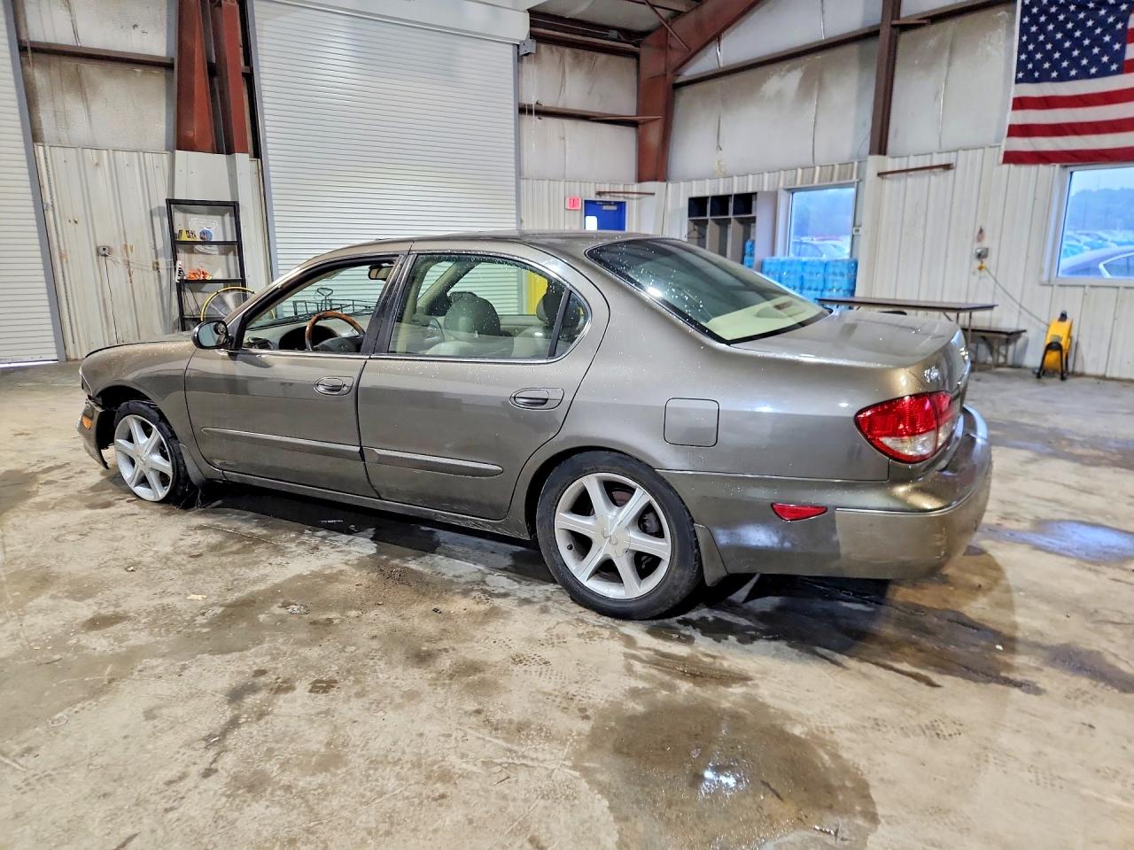 2003 Infiniti I35 Base Gold vin: JNKDA31A83T117785