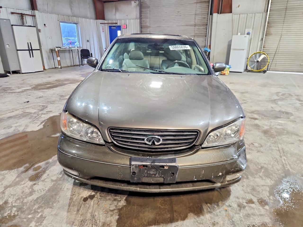 2003 Infiniti I35 Base Gold vin: JNKDA31A83T117785