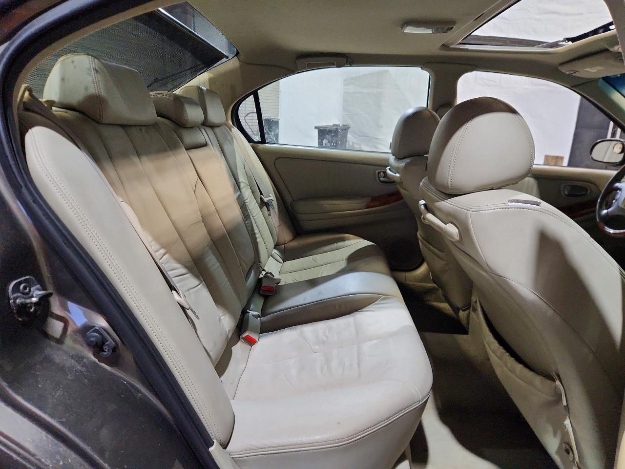 2003 Infiniti I35 Base Gold vin: JNKDA31A83T117785