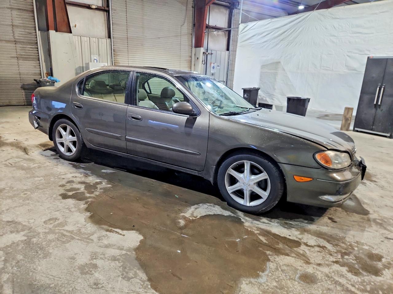 2003 Infiniti I35 Base Gold vin: JNKDA31A83T117785