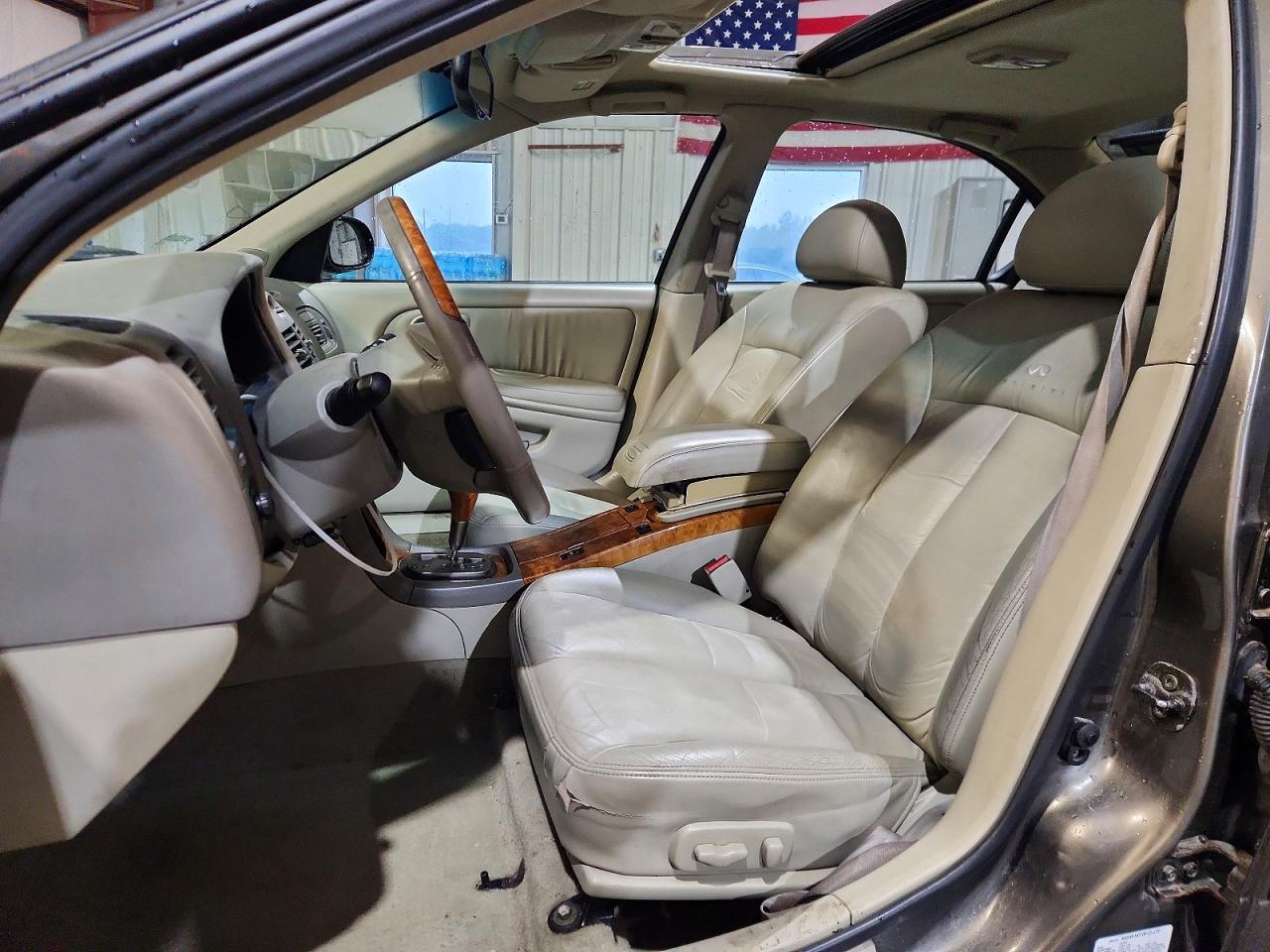 2003 Infiniti I35 Base Gold vin: JNKDA31A83T117785