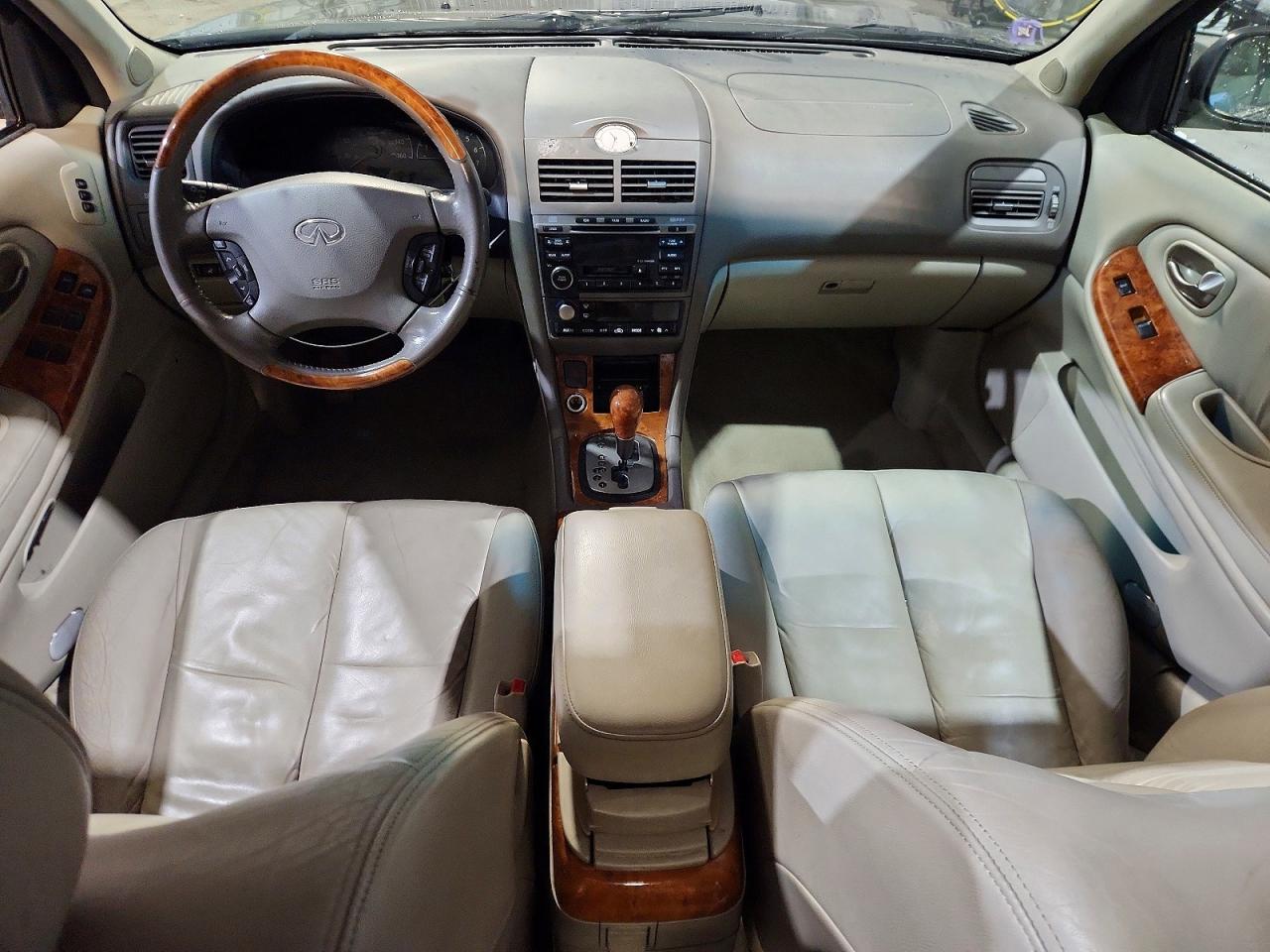 2003 Infiniti I35 Base Gold vin: JNKDA31A83T117785