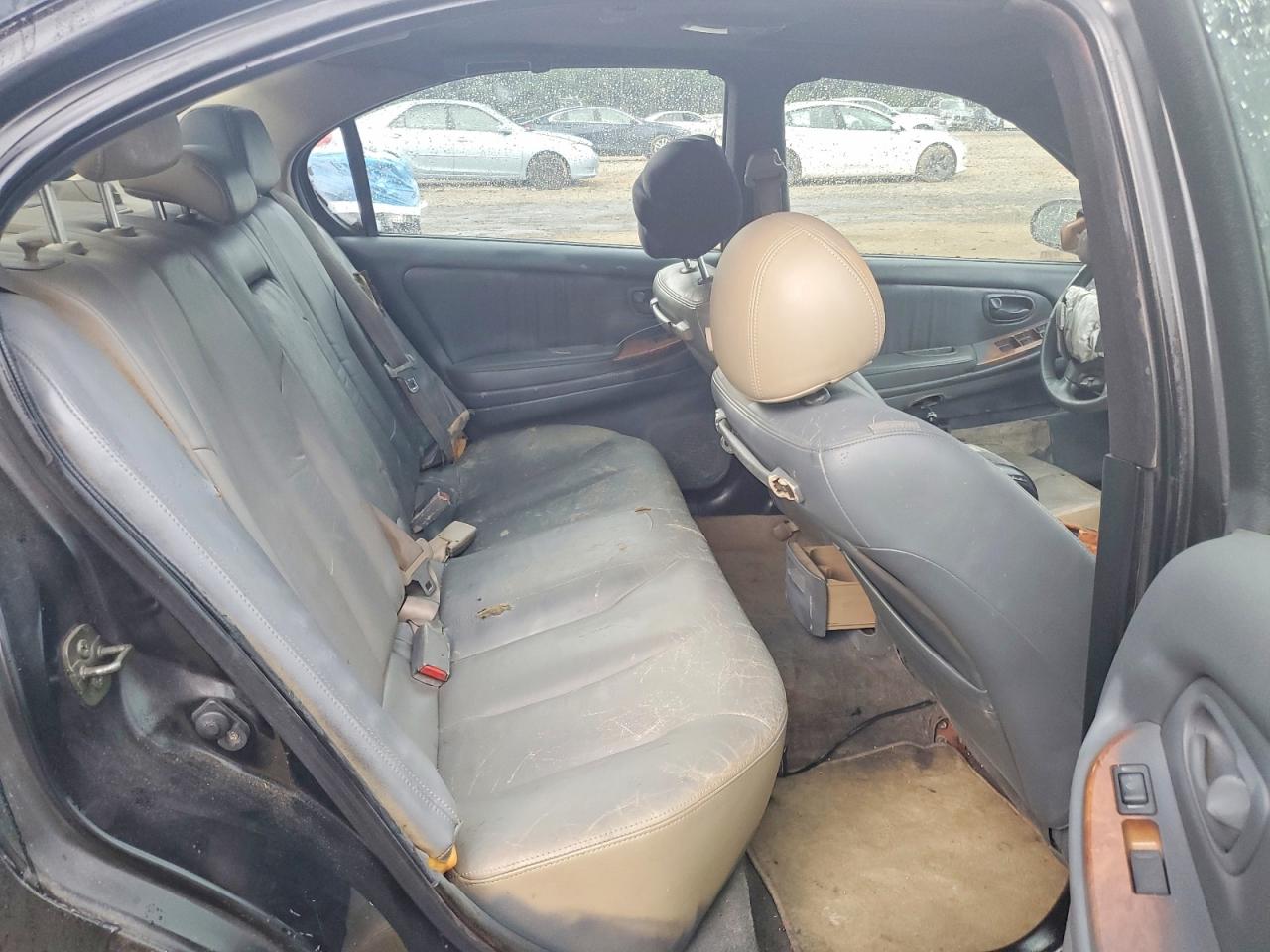 2002 Infiniti I35 Base Черный vin: JNKDA31A92T004250