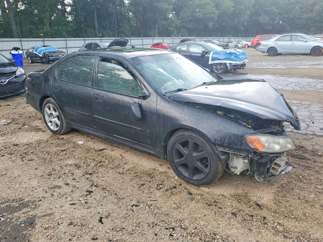2002 Infiniti I35 Base Черный vin: JNKDA31A92T004250