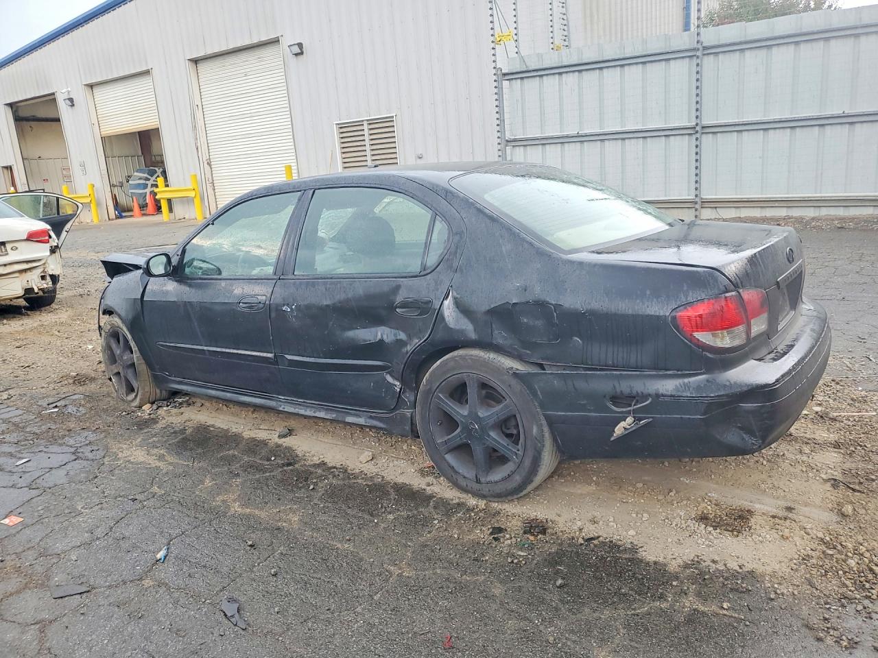 2002 Infiniti I35 Base Черный vin: JNKDA31A92T004250