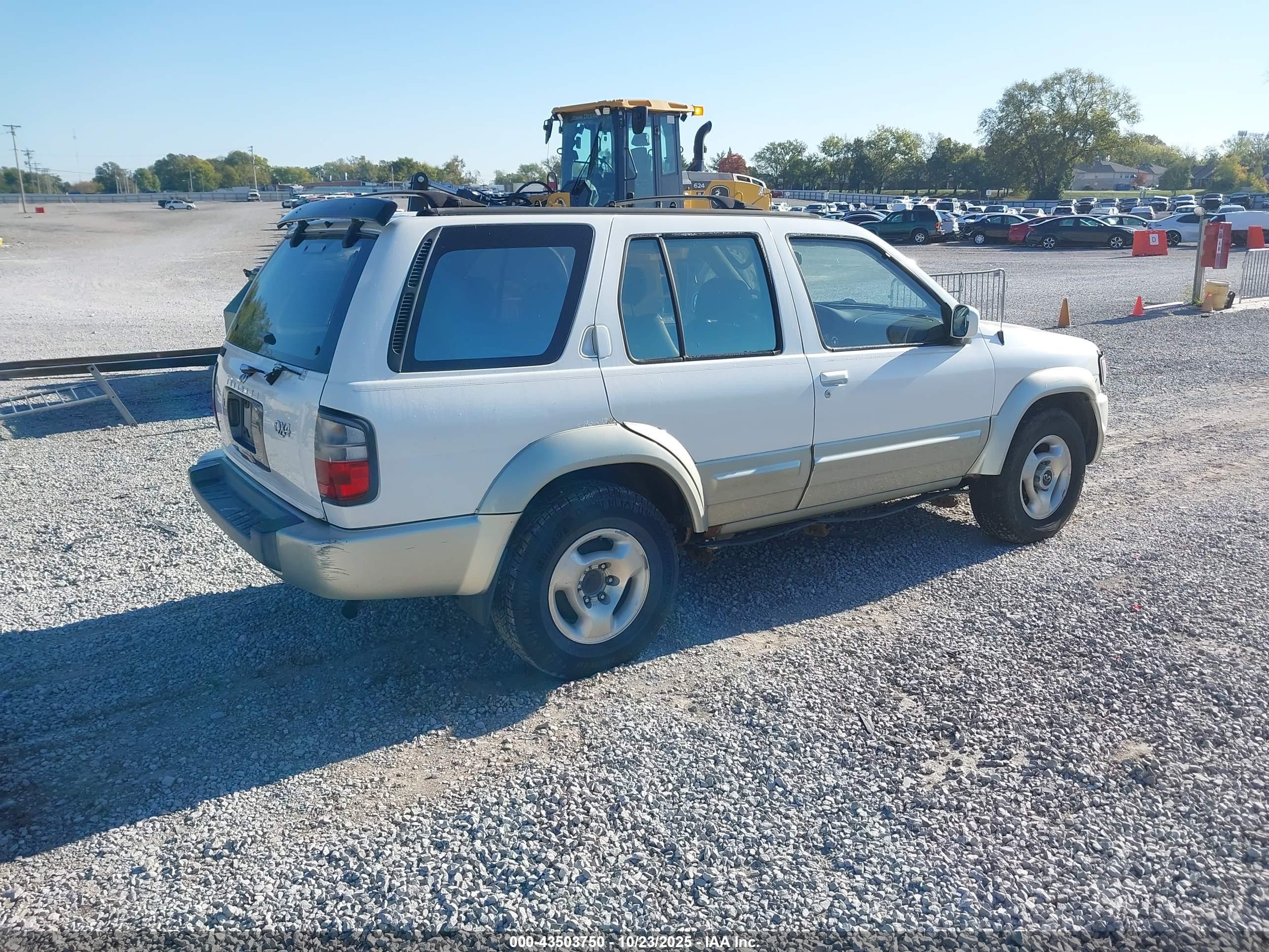 1998 Infiniti Qx4   White vin: JNRAR05Y9WW034131